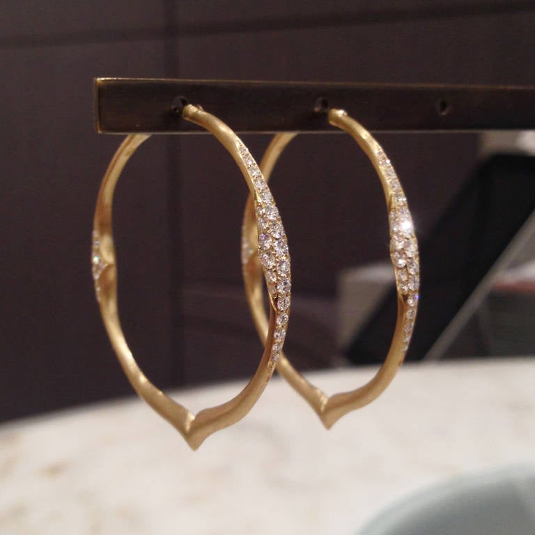 Handcrafted Hoop Earrings in matte 18k yellow gold with 1.42 carats of exceptional white diamonds.