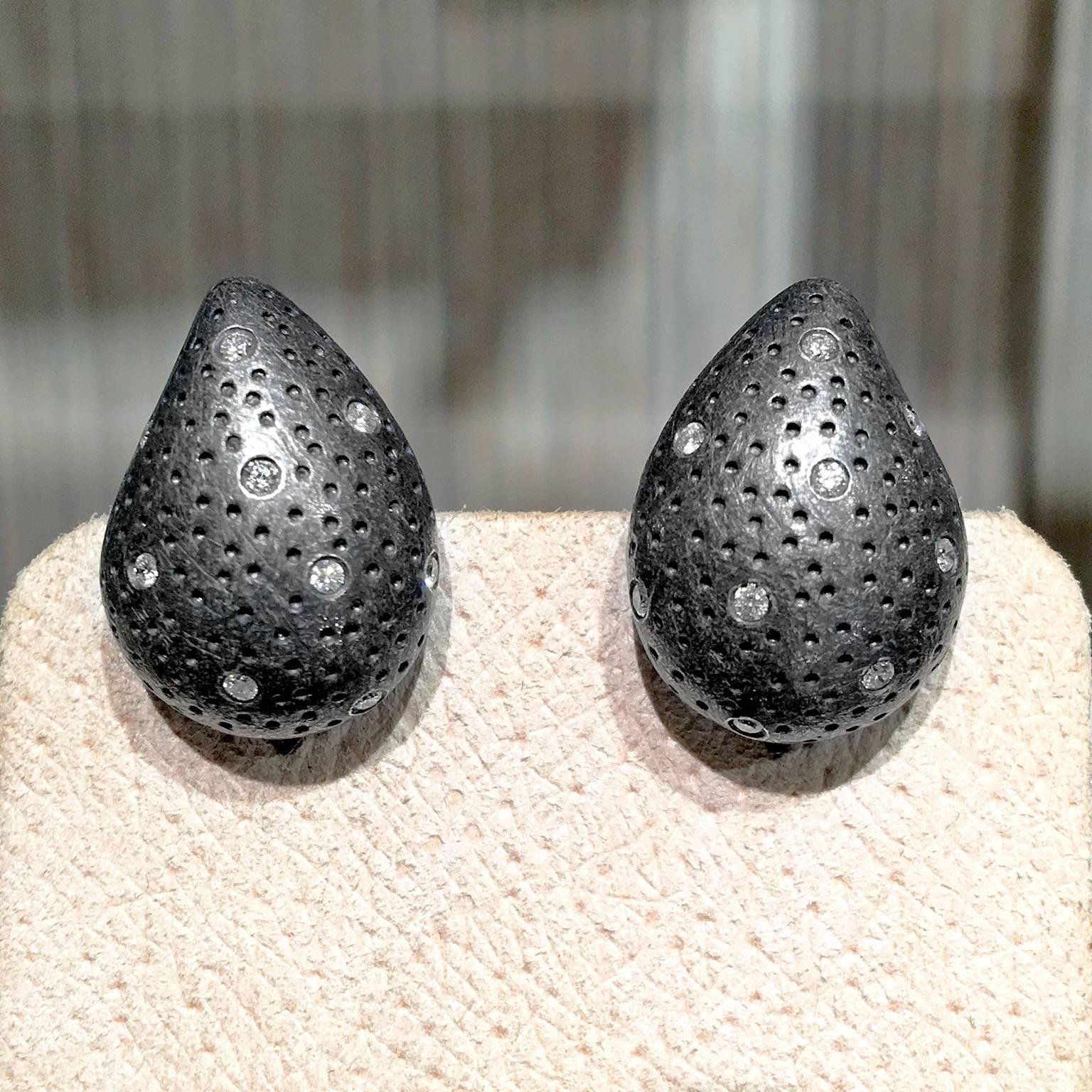 Diamond Dust Paisley Clip Earrings handcrafted by renowned jewelry artist Pedro Boregaard in highly-textured and matte-finished oxidized sterling silver with twenty round brilliant-cut white diamonds weighing a total of 0.30 carats on ornamental