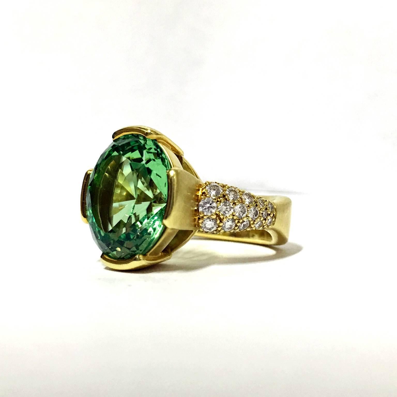 One-of-a-Kind Basket Ring handcrafted in satin-finished 18k yellow gold with a spectacular 9.68 carat faceted oval tsavorite (13mm x 11mm) and thirty round brilliant-cut F/vs1 diamonds totaling 0.77 carats. Size 6 (Can be Sized). 
