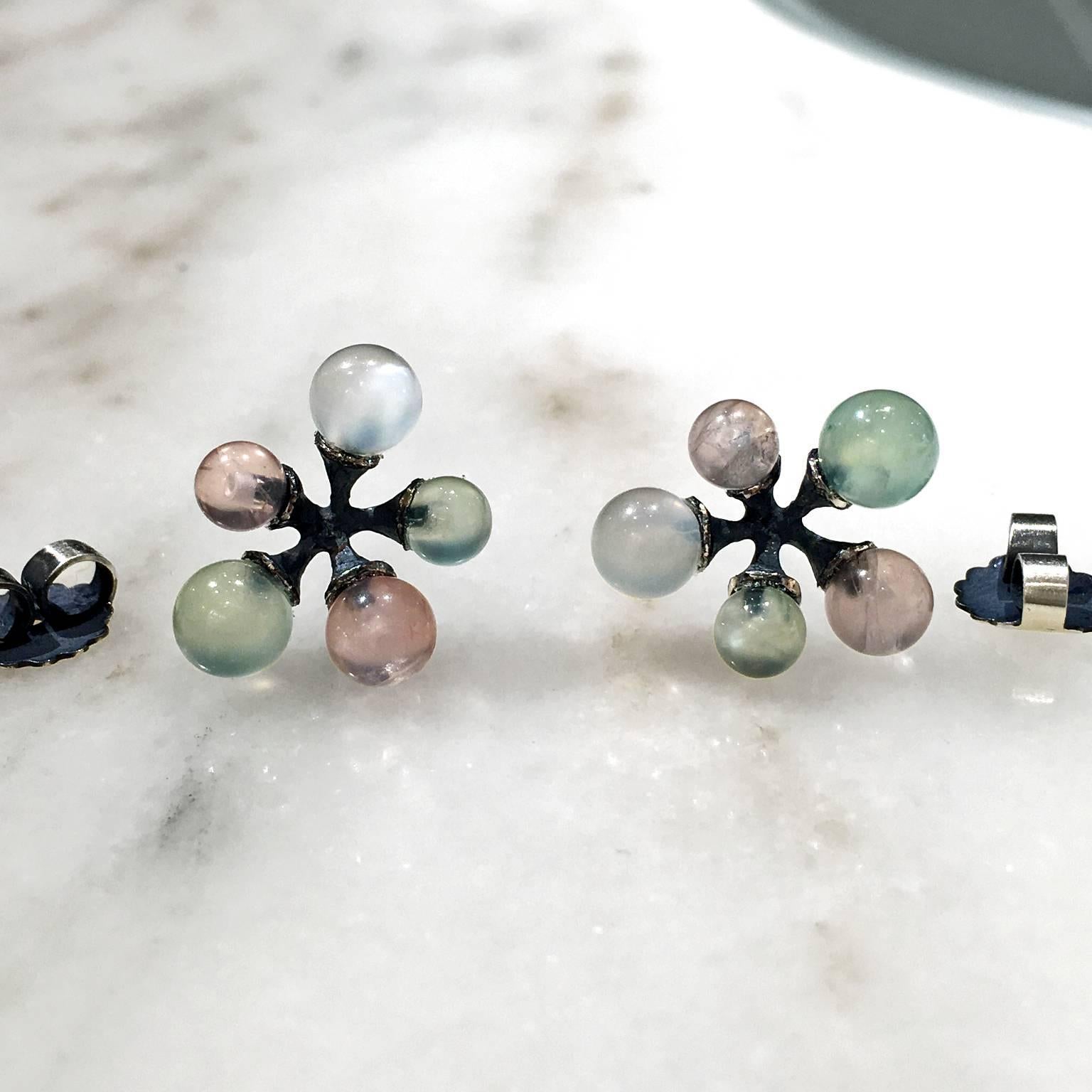 One-of-a-Kind Micro Jacks Earrings handcrafted in oxidized sterling silver with semi-translucent white moonstone, rose quartz, and prehnite and 18k yellow gold posts. 