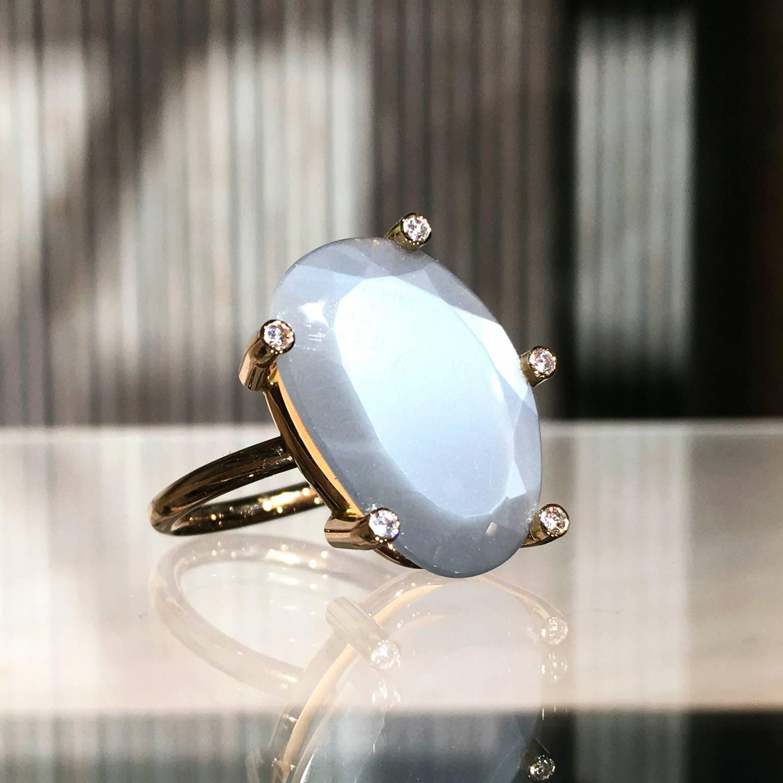 One-of-a-Kind Snowflake Ring handcrafted in 18k rose gold with an 8.30 carat faceted gray moonstone showcasing gorgeous adularescence, and complemented by five bezel-set round brilliant-cut F/vs1 diamonds totaling 0.07 carats.  Size 7.25 (can be