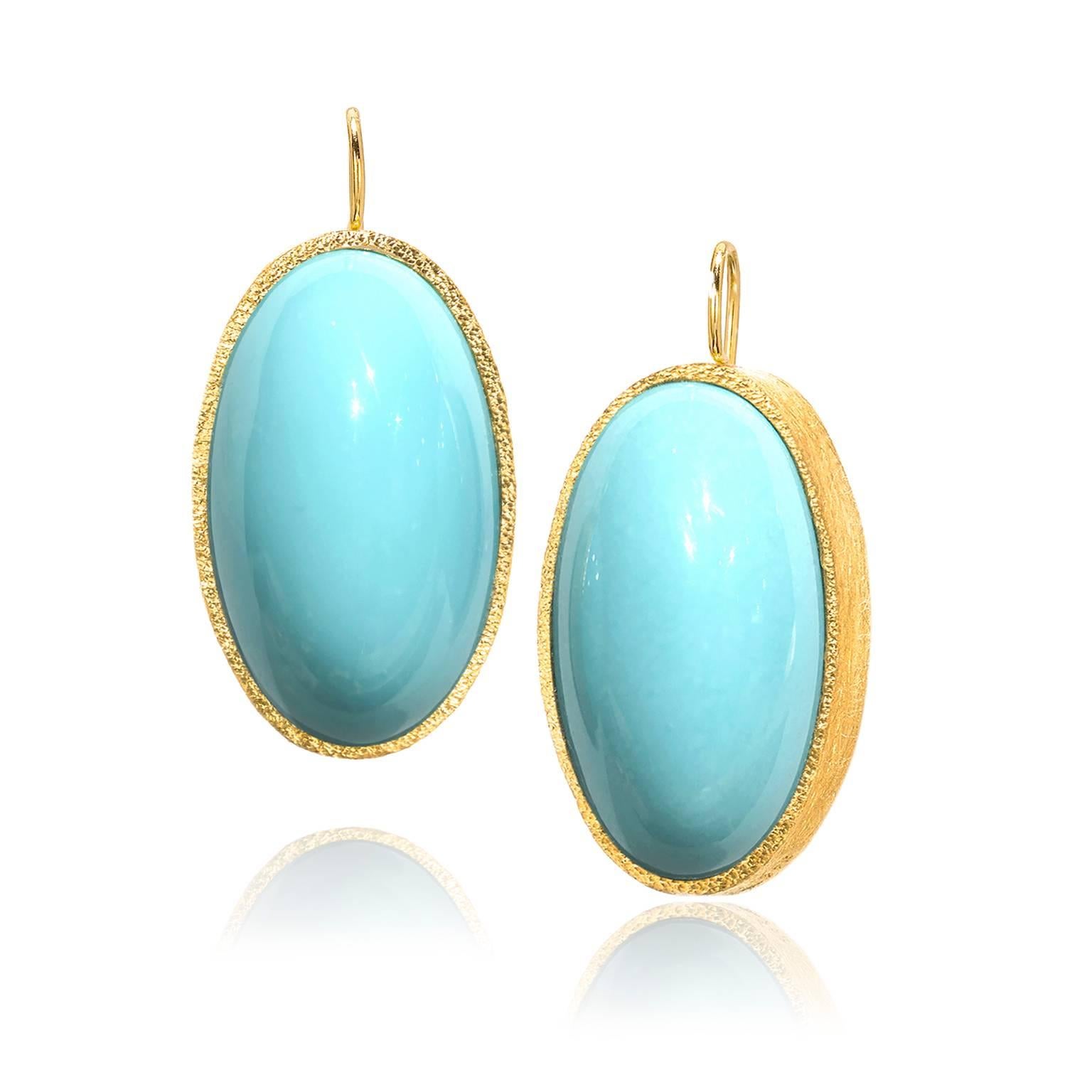 One-of-a-Kind Oval Bubble Earrings handcrafted by renowned jewelry artist Devta Doolan in his signature 22k yellow gold showcasing exceptional quality and color matched Persian turquoise cabochons bezel-set and hanging from gold wires. 

Each