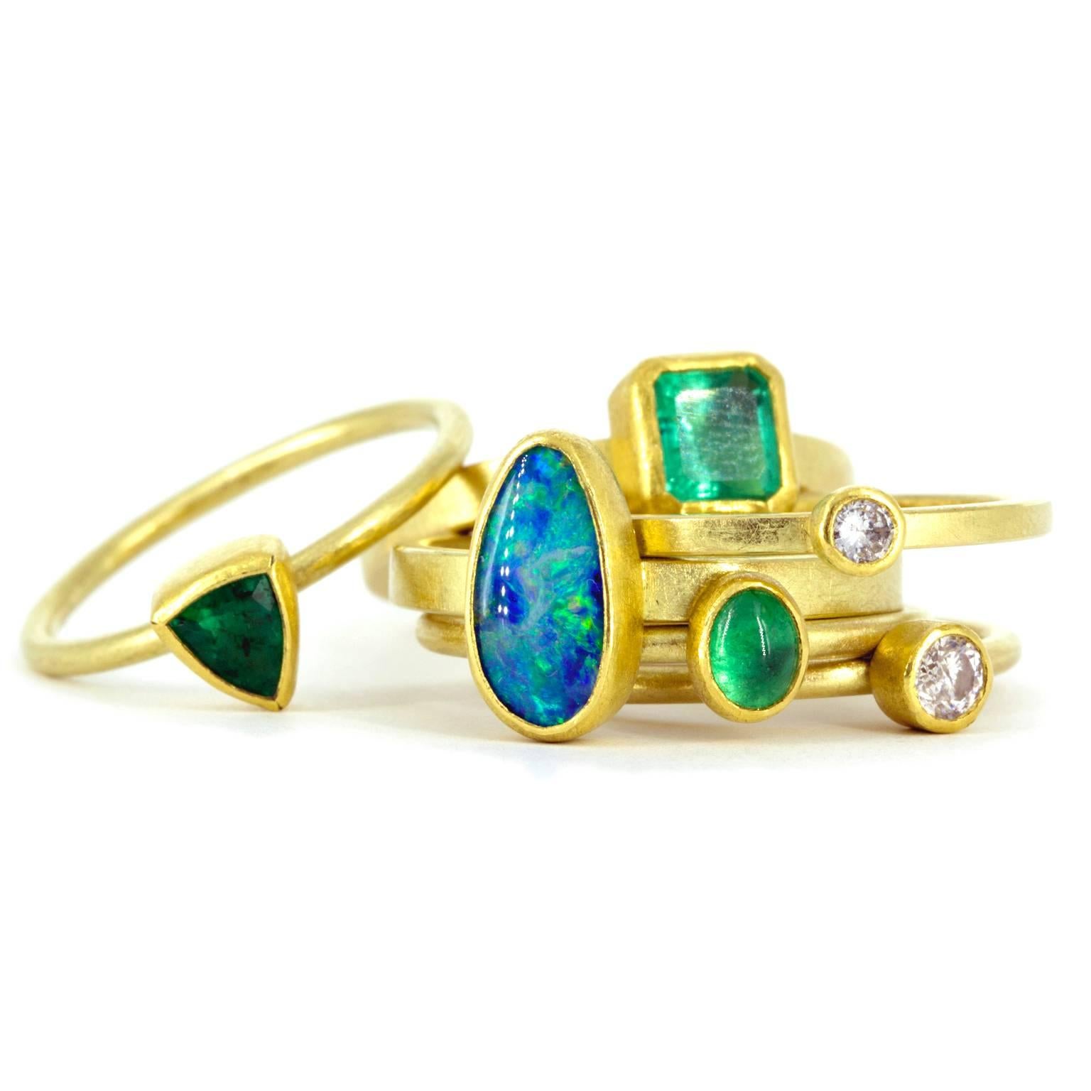 One-of-a-Kind Stacking Ring Set (also available individually; can be sized) handcrafted by jewelry artist Petra Class with assorted width 22k yellow gold and 18k yellow gold bands. Showcasing bezel-set gemstones from top to bottom:

0.50 carat