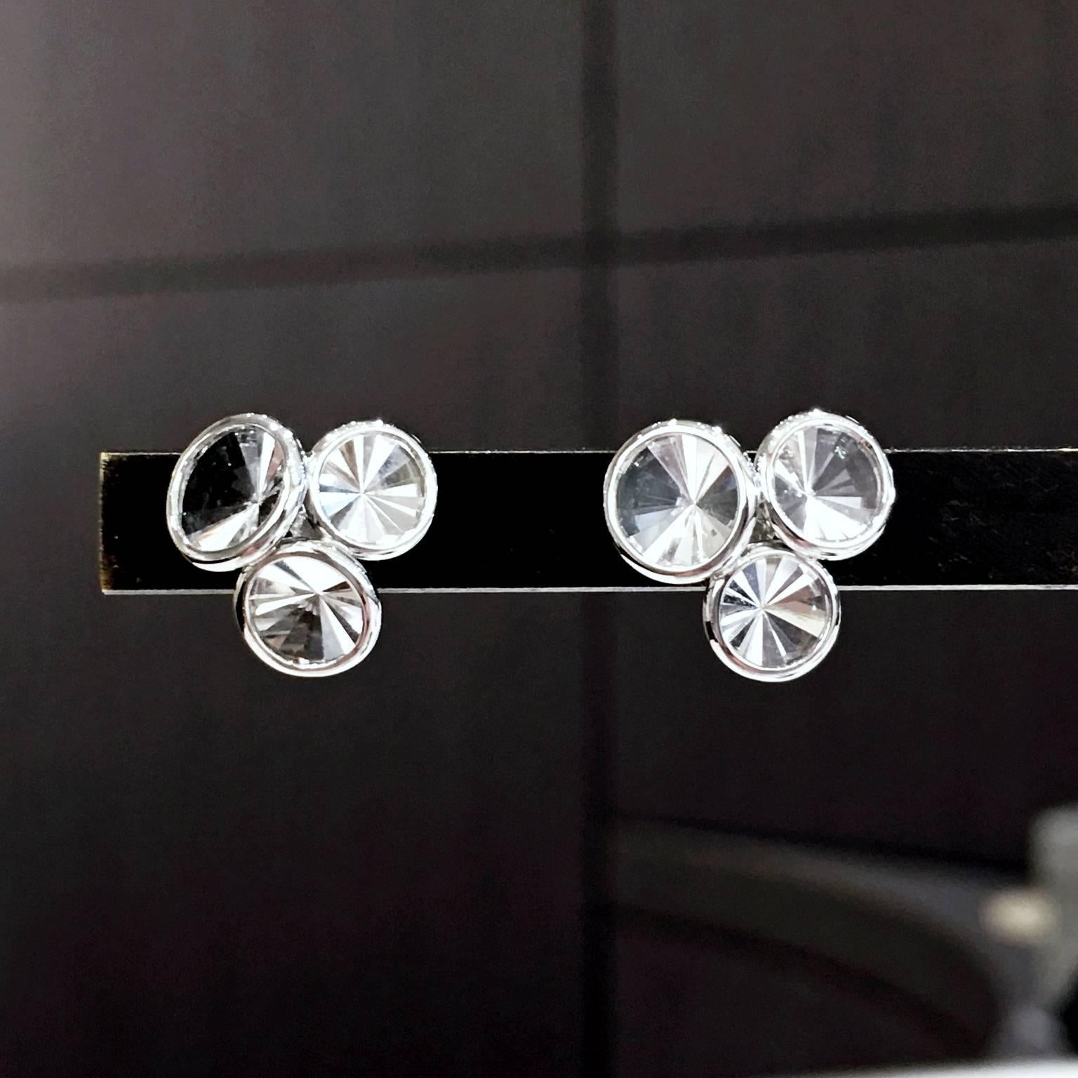 Handcrafted Mini Celebration Earrings with six total infinity-cut clear rock crystal quartz elements set in polished 18k white gold with custom made 18k white gold posts and backs.

Stamped 750 / Antonio Bernardo / with AB Hallmark