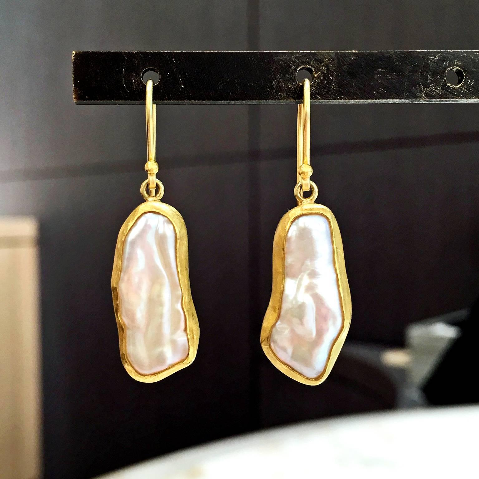 One-of-a-Kind Drop Earrings handcrafted by award winning jewelry artist Petra Class in matte-finished 22k yellow gold on matte-finished 18k yellow gold wires with stunning bezel-set pink-toned white sweetwater baroque pearls exhibiting magnificent