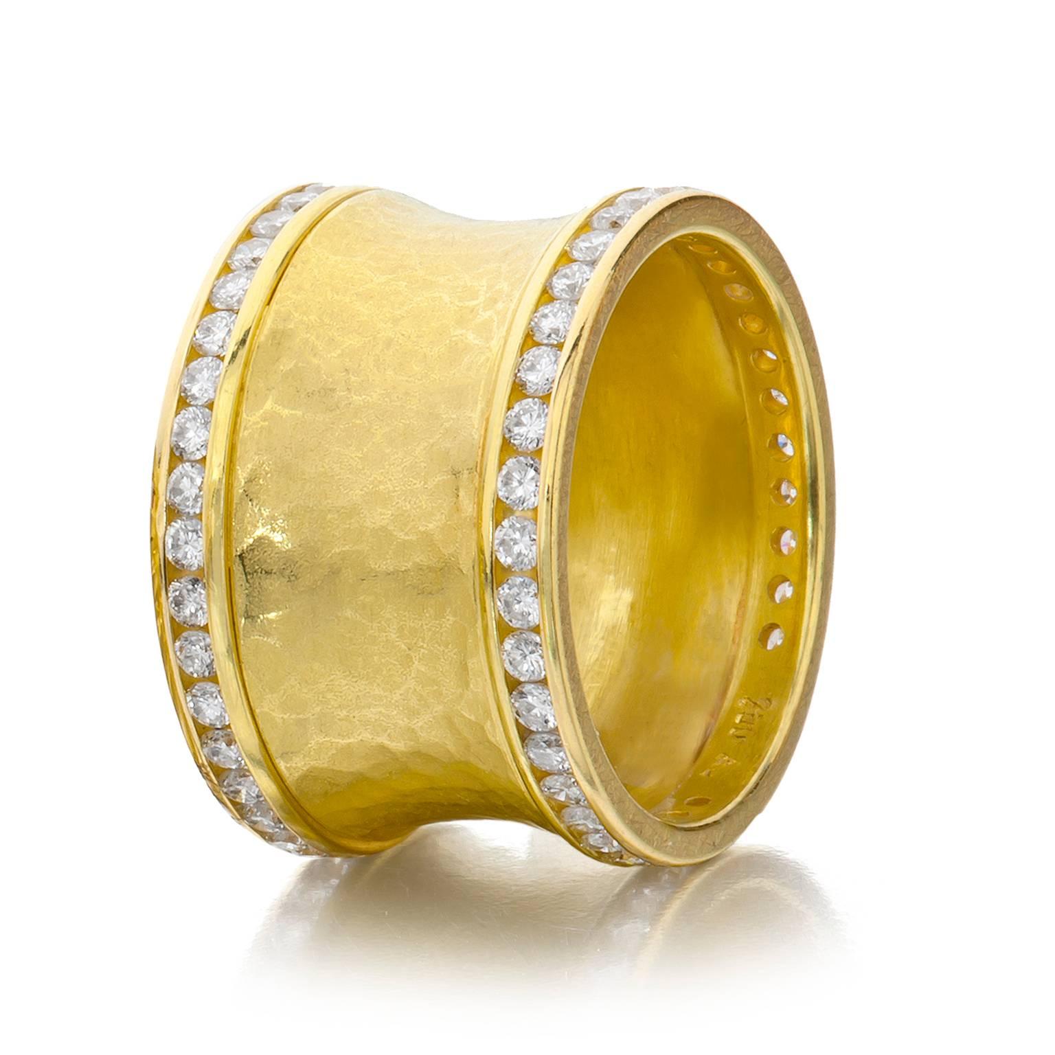 Curve Band handcrafted in 18k yellow gold featuring channel-set round brilliant-cut white diamonds totaling 1.24 carats and a signature hand-hammered finish accented with polished 18k yellow gold. (Size 7.5, 13mm wide).