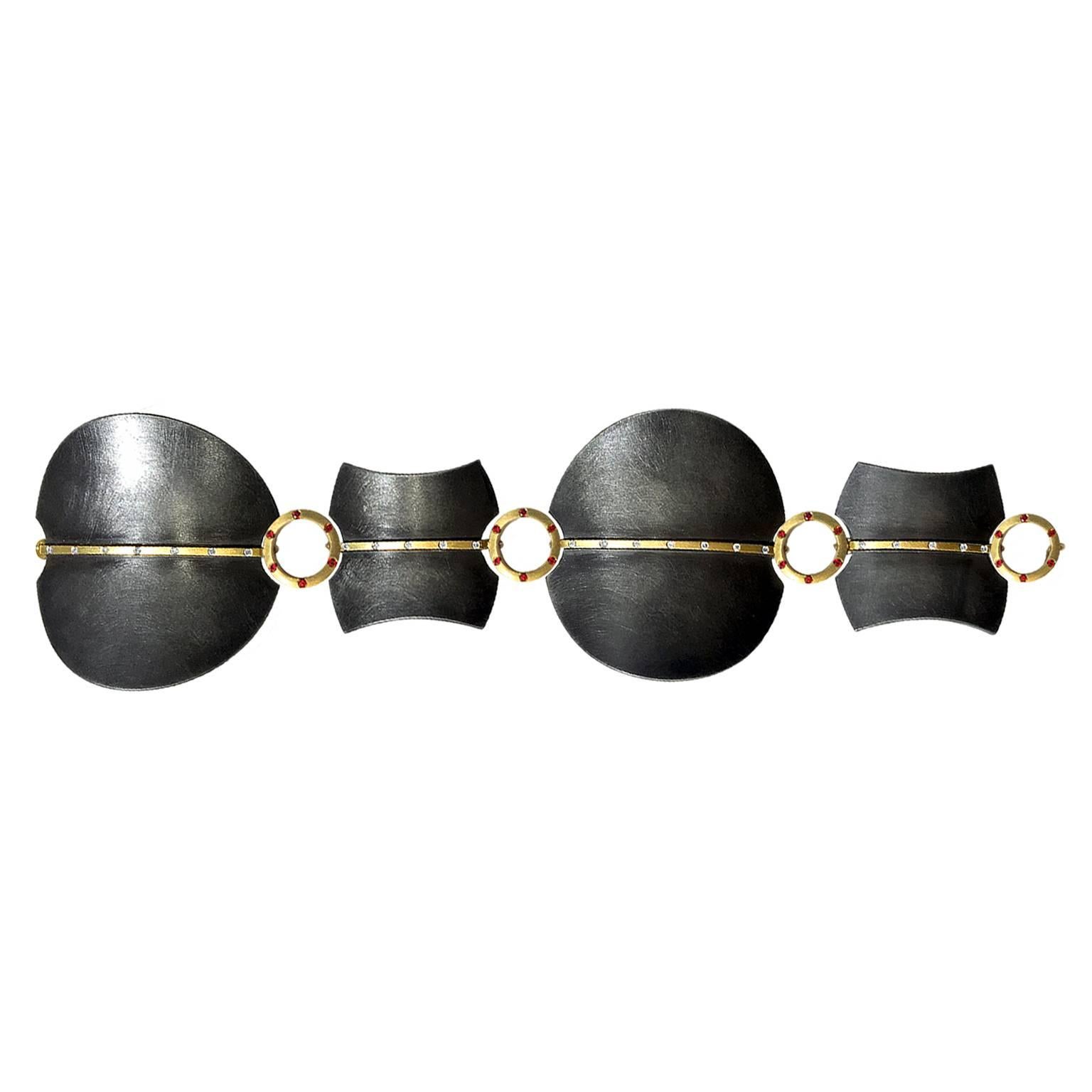 One of a Kind intricately detailed Umbra Bracelet by award winning jewelry artist Robin Waynee, handcrafted showcasing four matte-finished oxidized sterling silver elements accented by 18k yellow gold bars embedded with bezel-set round brilliant-cut