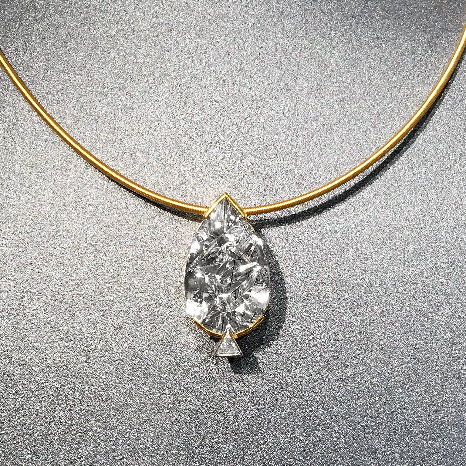 One of a Kind Pendant Necklace showcasing a 13.98 carat 