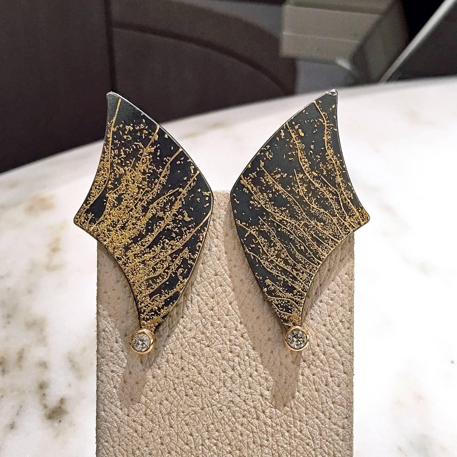 One of a Kind Wing Earrings handcrafted by internationally collected jewelry artist Atelier Zobel (Peter Schmid) in a combination of 18k yellow gold, 24k gold, and oxidized sterling silver with two round brilliant-cut cognac diamonds totaling 0.18