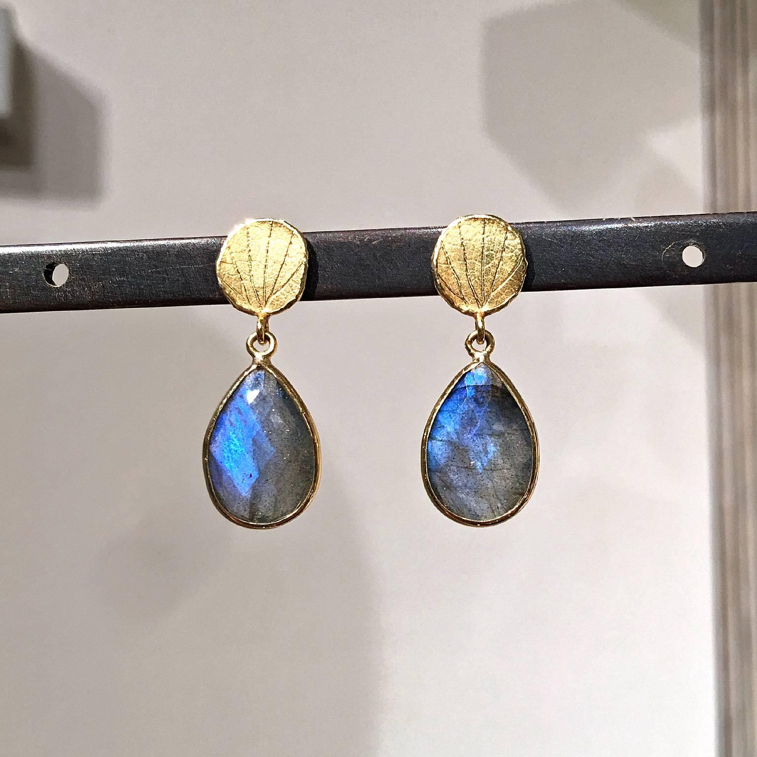 Dangle Earrings handcrafted by award winning jewelry artist Barbara Heinrich featuring a pair of faceted labradorite with beautiful, strong colorplay, bezel-set in polished 18k yellow gold and attached to signature matte-finished 18k yellow gold