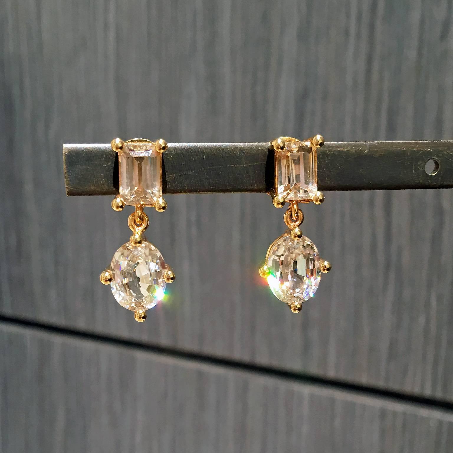 One of a Kind Princess Earrings handcrafted in Idar Oberstein, Germany by renowned master jewelry artist Erich Zimmermann in 18k yellow-toned rose gold showcasing two sets of spectacular, fiery, brilliant-cut natural Tanzanian zircons, one set