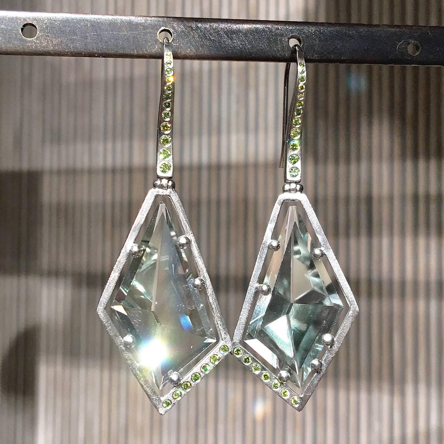 One of a Kind Drop Earrings showcasing two custom-cut and faceted sage green amethysts handcrafted in etched-finish 950 palladium with ice green (enhanced color) diamond accents totaling 0.2622 carats. 