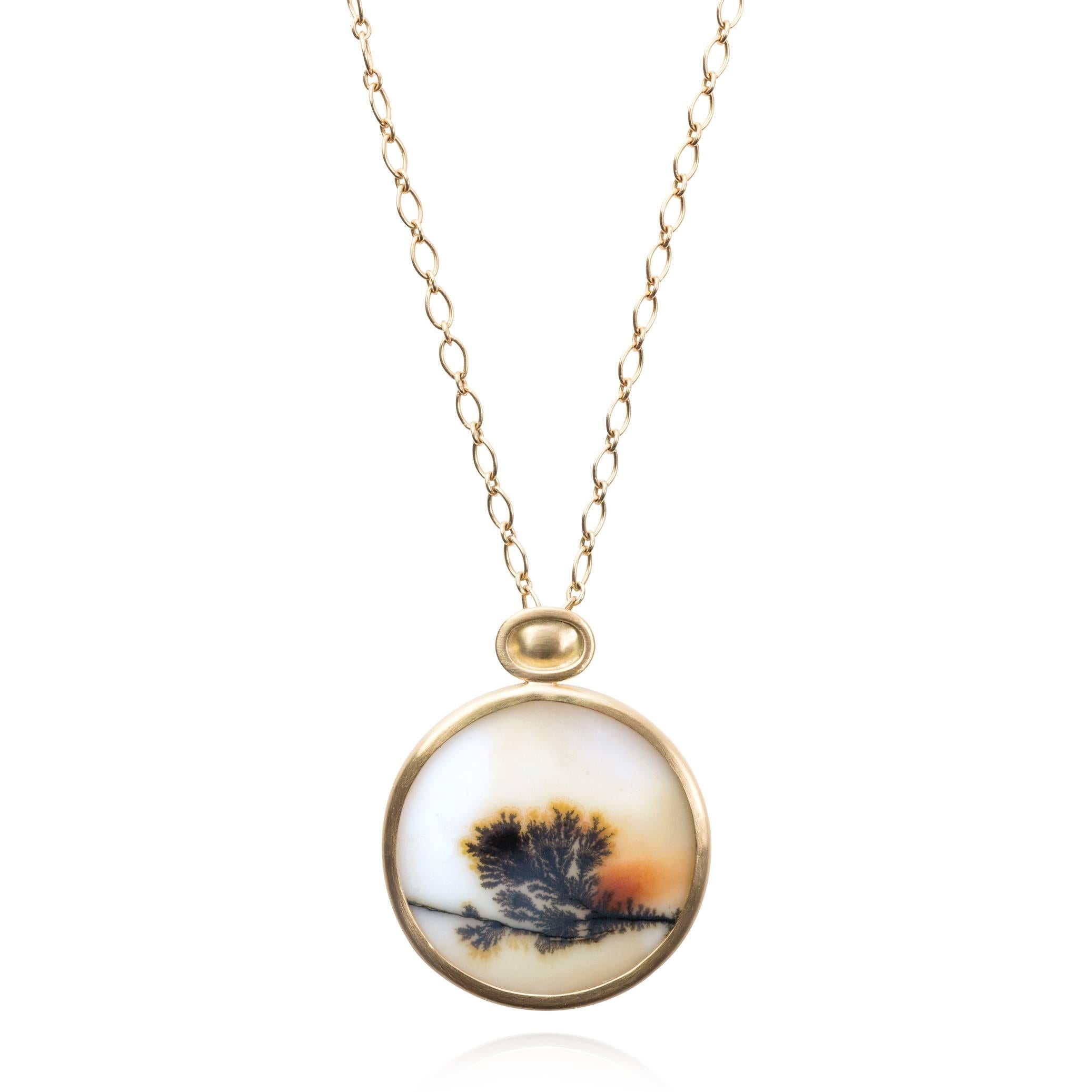 One of a Kind Bonzai Tree Sunset Necklace handcrafted by Monica Marcella in matte-finished 18k yellow gold featuring a spectacular natural white agate with black dendrite surrounded by soft orange and red accents. The gemstone depicts a beautiful