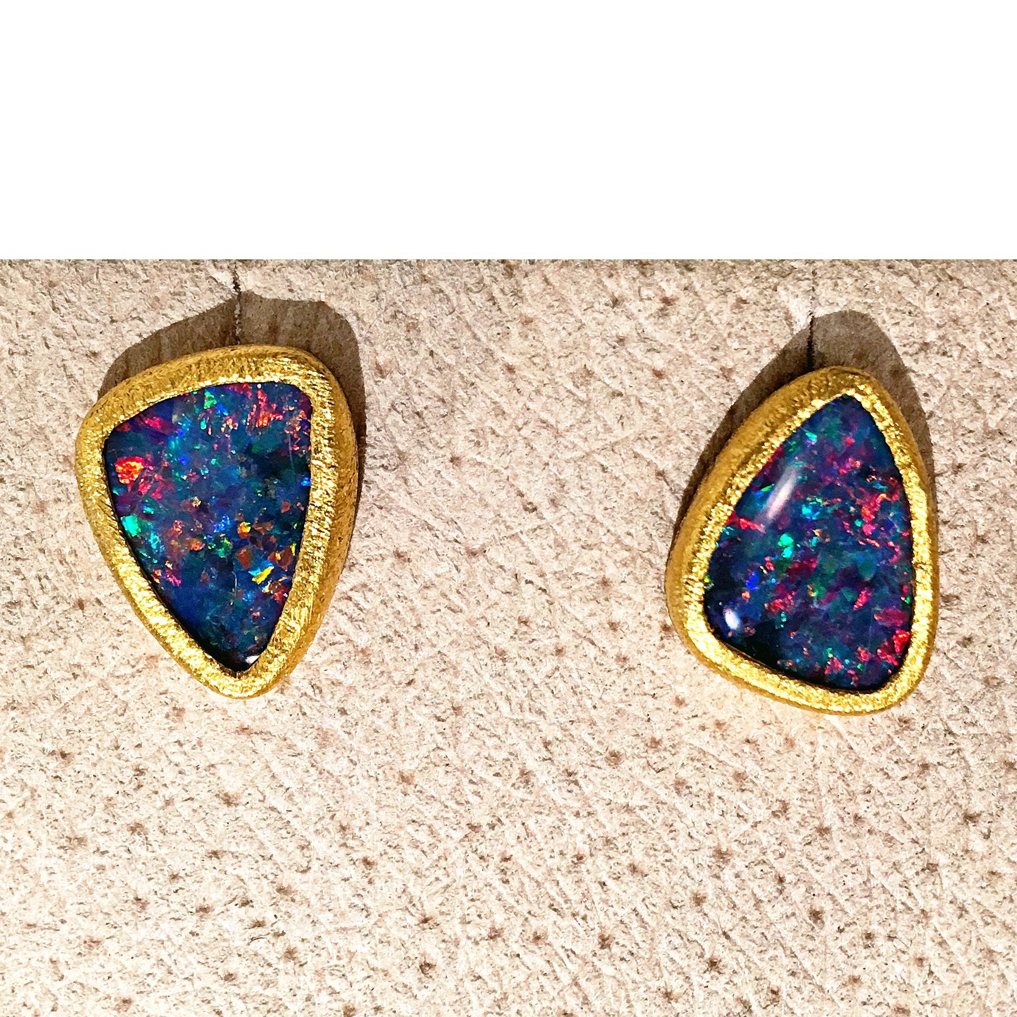 One of a Kind Stud Earrings handcrafted by acclaimed jewelry designer Devta Doolan in February 2017, with violet blue opal doublets exhibiting a vibrant multicolored confetti flash with electrifying green, orange, blue, yellow, violet, and purple