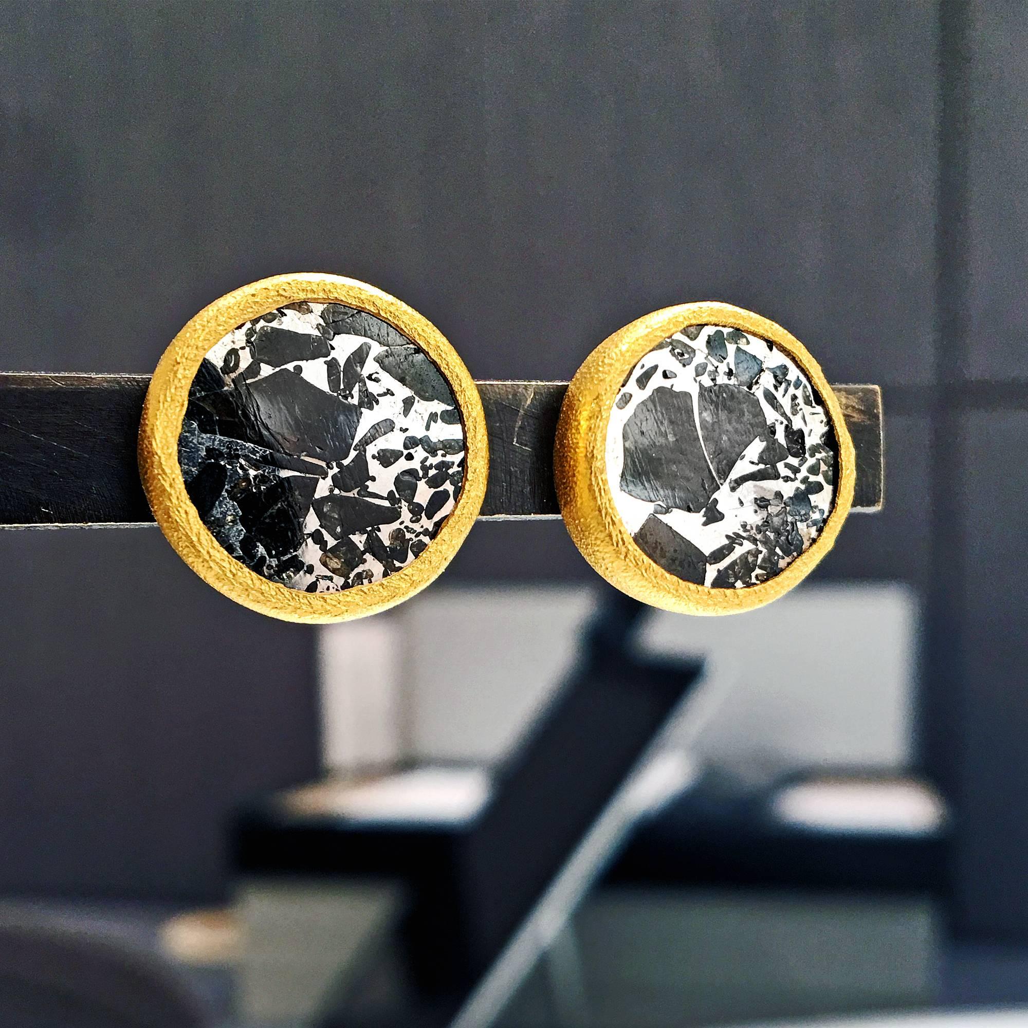 One of a Kind Stud Earrings handcrafted by jewelry artist Devta Doolan in beautifully-finished 22k yellow gold showcasing a pair of round meteorite coins with an incredible mirrored quality. 18k yellow gold posts and backs. Stamped and hallmarked