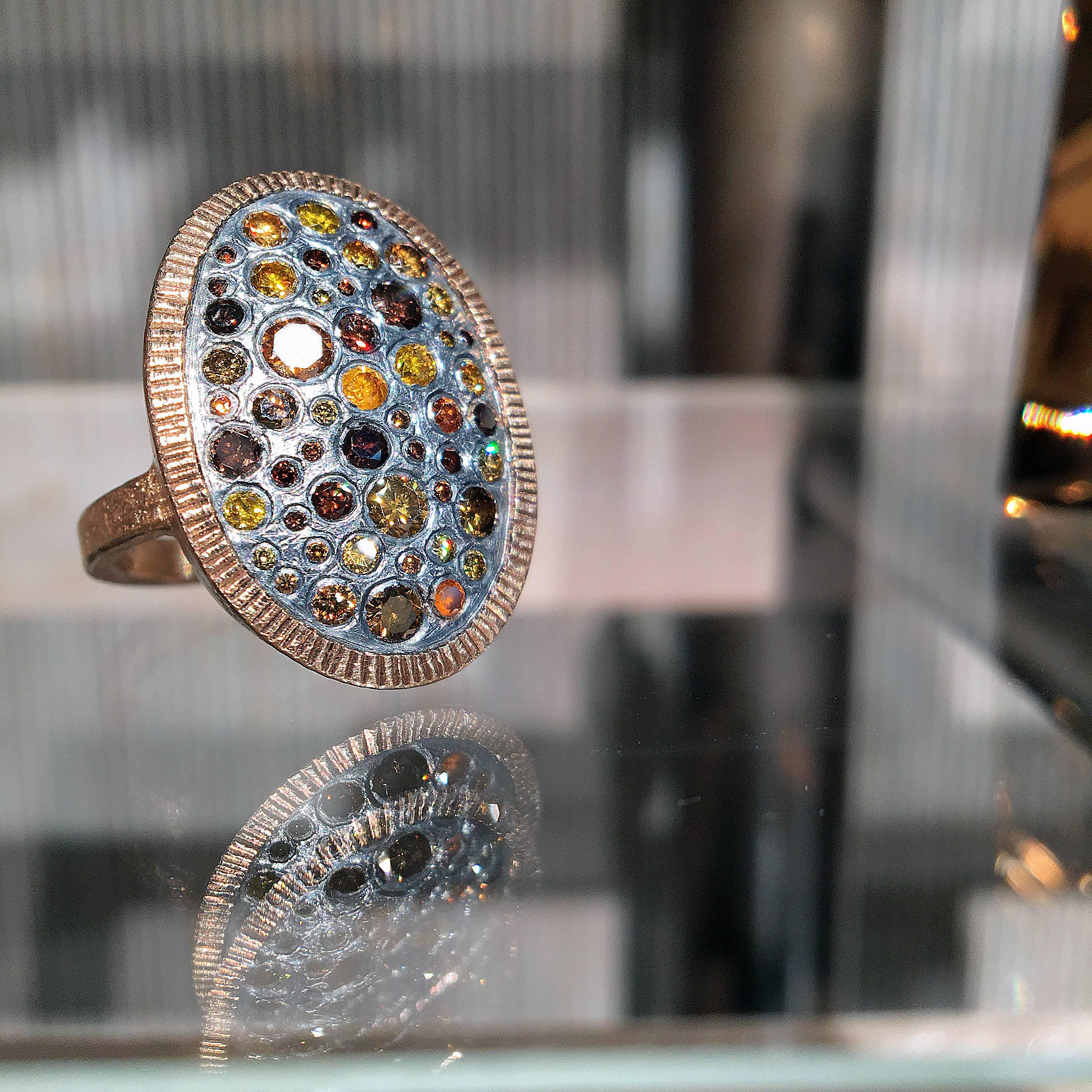 One of a Kind Scattered Multi Diamond Ring by acclaimed jewelry artist Todd Reed handcrafted in highly-textured 18k rose gold featuring 1.38 total carats of round brilliant-cut  Autumn Diamonds™ bezel-set in patina-finished sterling silver. Size 6.5