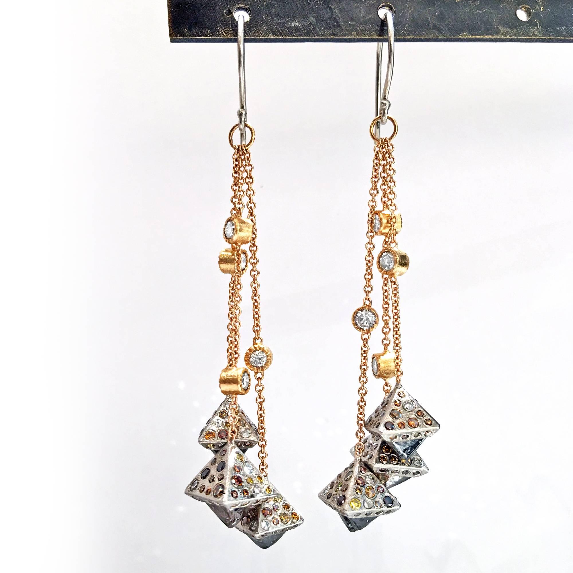 One of a Kind Dangle Drop Earrings by acclaimed master jewelry artist Todd Reed handcrafted in a combination of beautifully textured palladium and 18k rose gold featuring six signature diamond octahedrons totaling 7.73 carats set beneath 2.31 carats