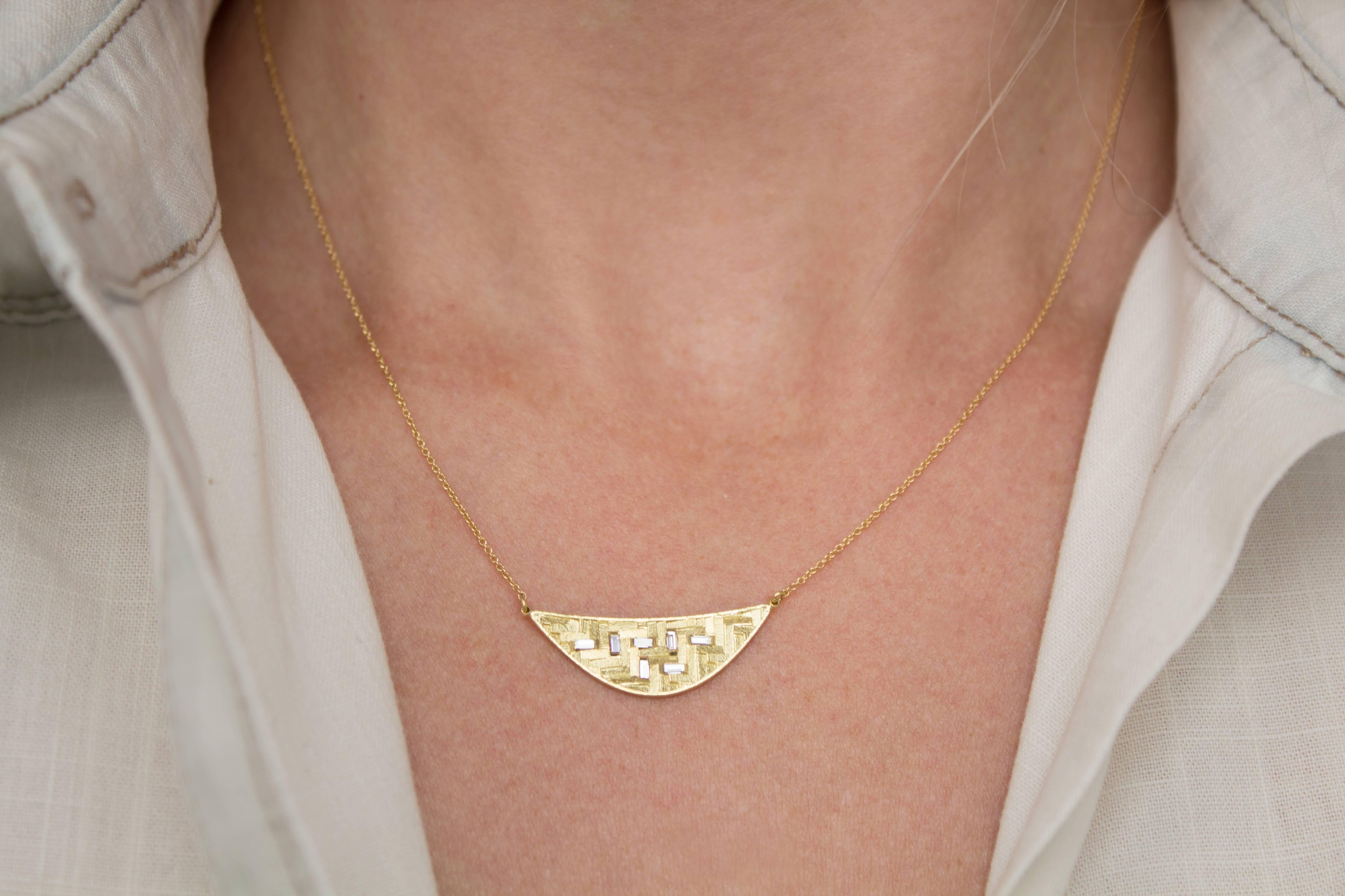 Crescent Parquet Necklace handcrafted in London by jewelry designer Jo Hayes Ward in her signature-finished reflective 18k yellow gold featuring seven white diamonds baguettes totaling 0.15 carats, on an 18k yellow gold 18