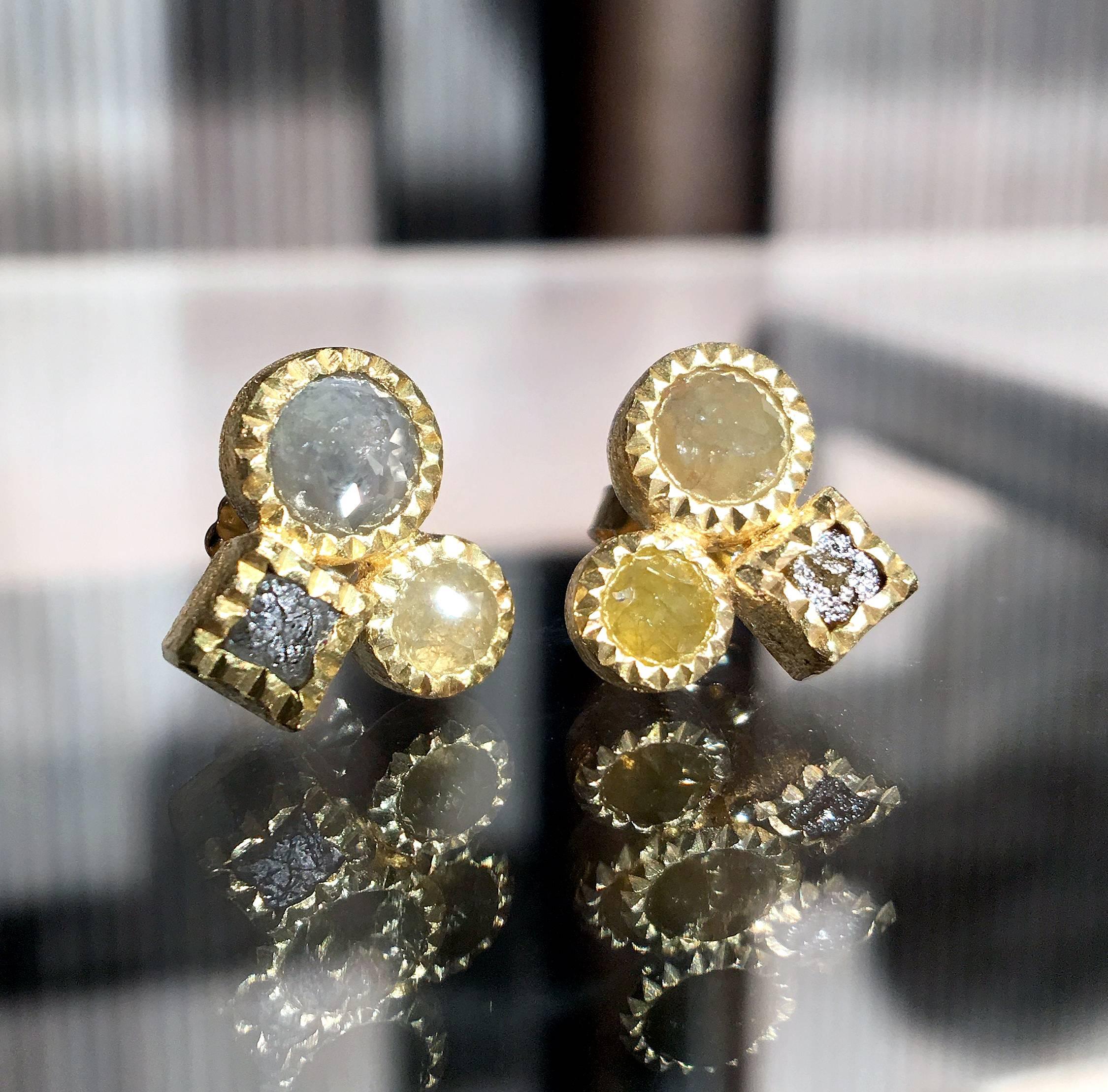 Mismatched Triple Stud Earrings handcrafted by award-winning jewelry artist Todd Reed in signature-finished 18k yellow gold featuring four rose-cut diamonds totaling 2.42 carats accented by two raw diamond cubes totaling 0.80 carats. Stamped and