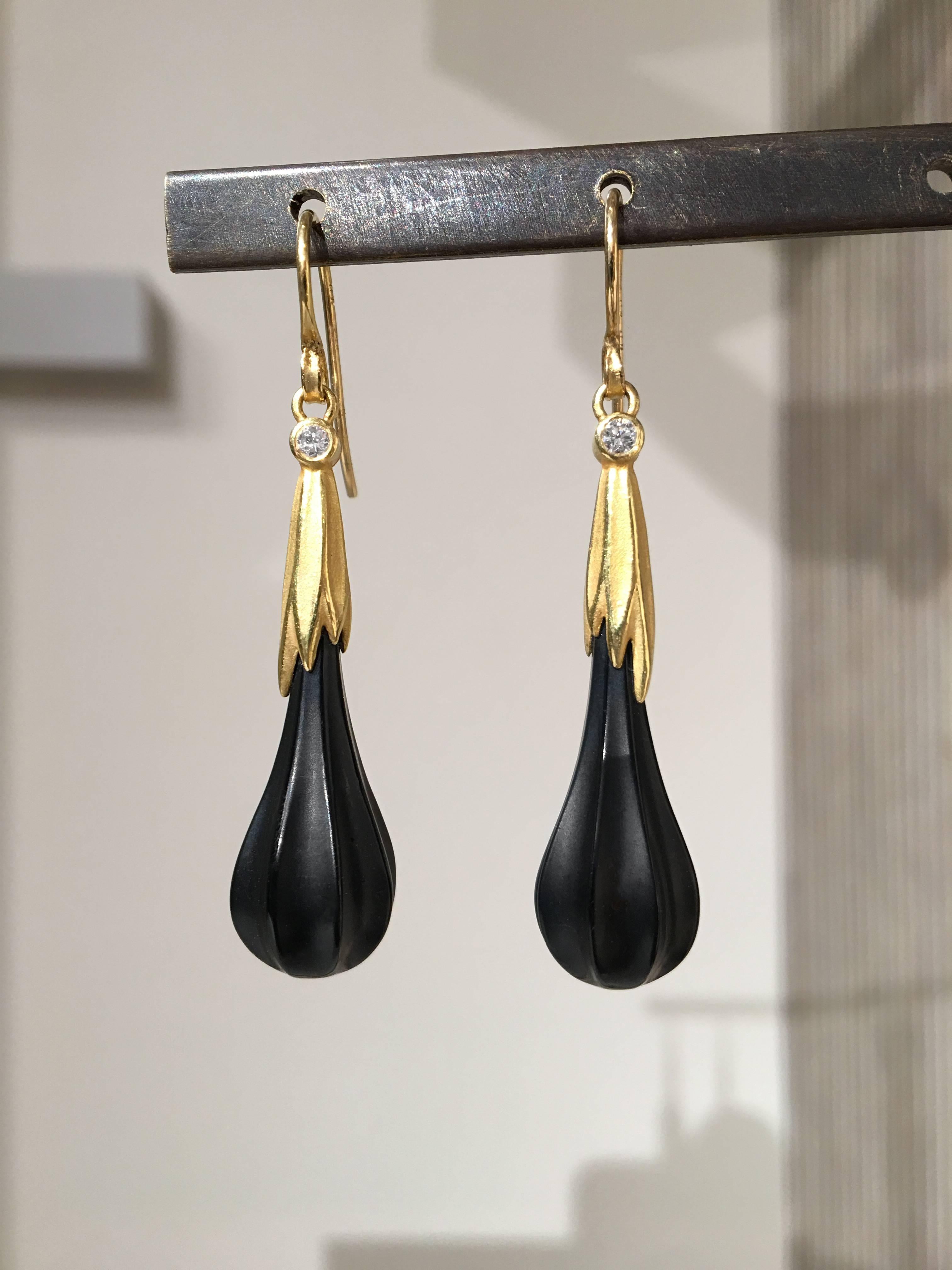 One of a Kind Cap Drop Earrings handcrafted by award-winning jewelry maker Barbara Heinrich in signature-finished 18k yellow gold featuring a matched pair of matte-finished carved black onyx drops accented by two round brilliant-cut white diamonds