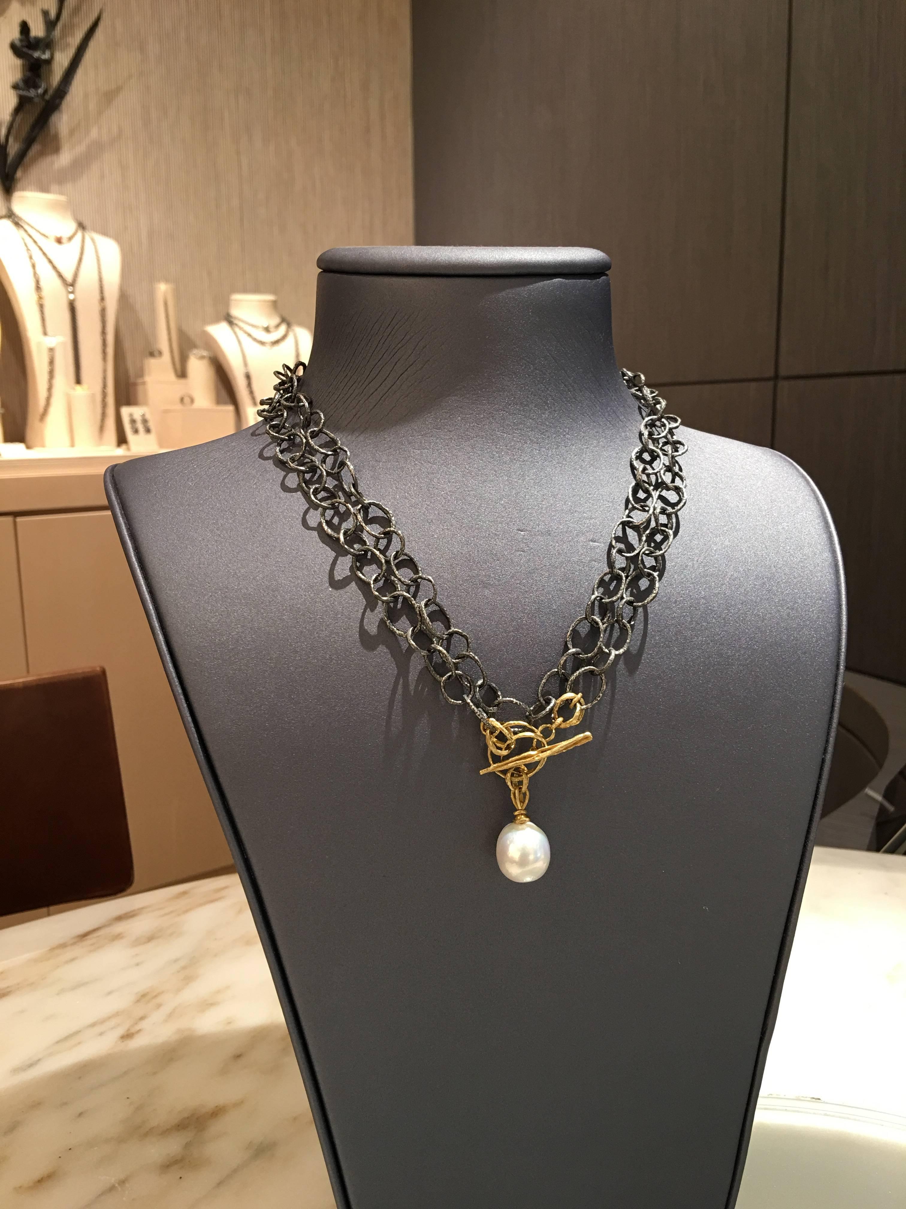 Oval Twig Chain Necklace and Lariat handcrafted by renowned and award winning jewelry artist John Iversen in oxidized sterling silver featuring a spectacular, lustrous South Sea pearl (15mm x 14mm) attached to an 18k yellow gold toggle clasp that