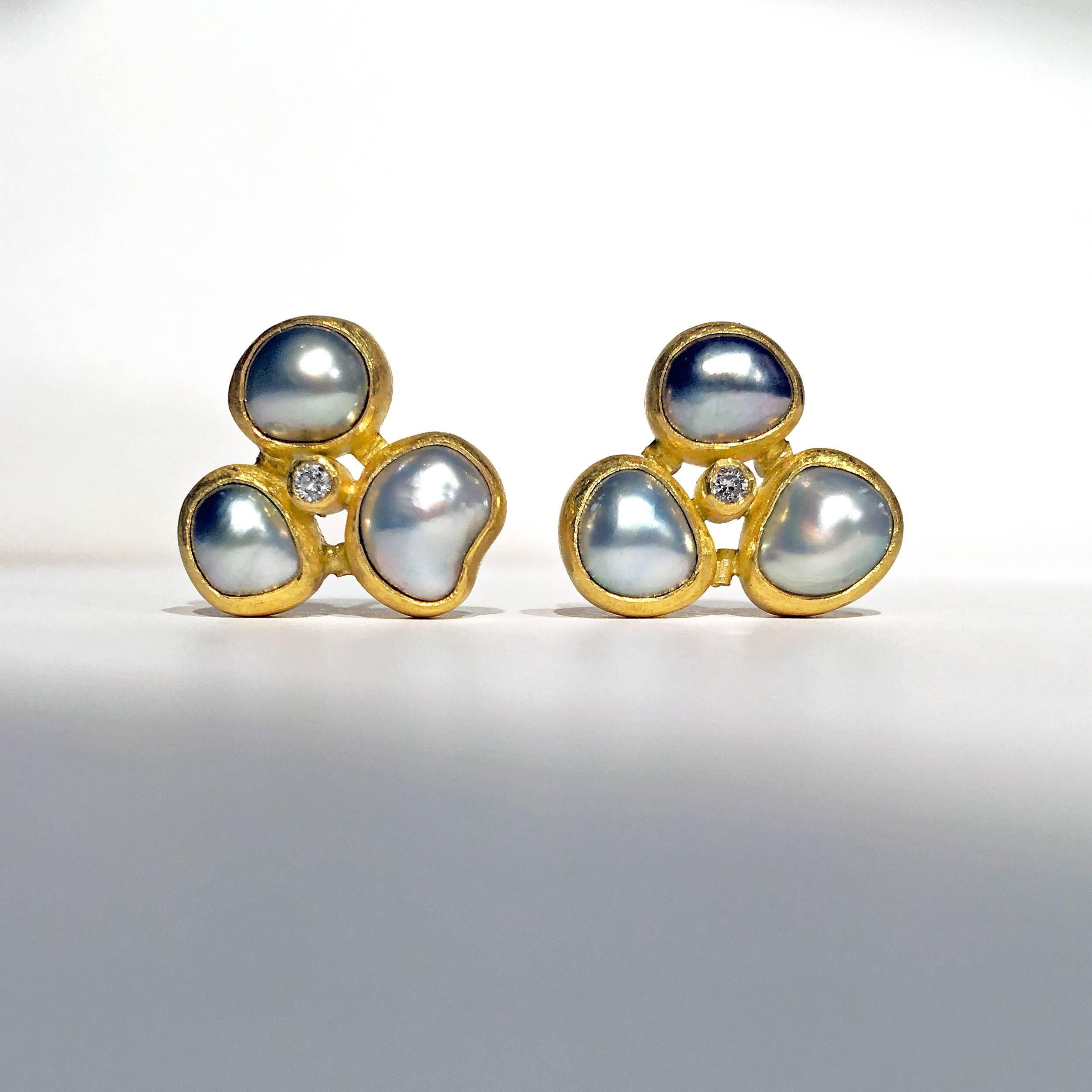 One of a Kind Triple Stud Earrings handcrafted by jewelry artist Petra Class in matte-finished 22k yellow gold featuring six lustrous Tahitian pearls and round brilliant-cut white diamonds on 18k yellow gold posts. Stamped and hallmarked 18k / 22k /