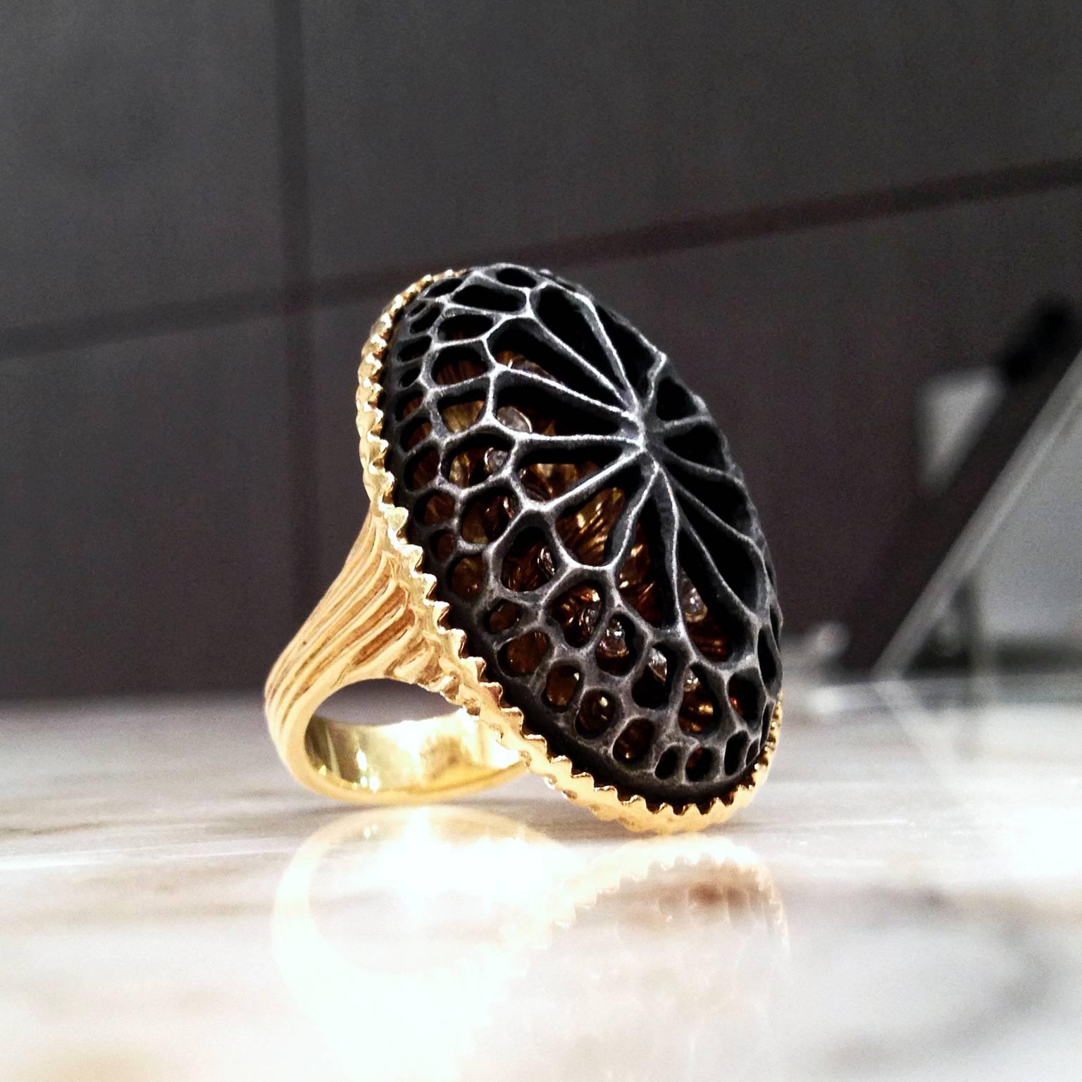 One-of-a-Kind Caged Coral Oval Ring handcrafted in 18k yellow gold with white diamonds totaling 0.82 carats bezel-set under the artist's signature cobalt chrome-finished coral dome.