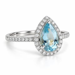 1 Carat Pear Aquamarine and Diamond Halo Ring in 18K White Gold