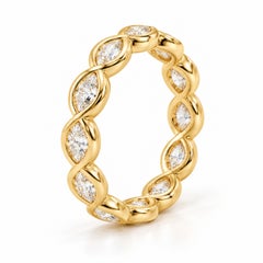 Alliance « éternité » en or jaune 18 carats sertie d'un diamant naturel taille marquise de 0,87 ct