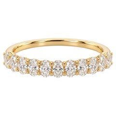 Bague demi-éternité en or jaune 18 carats sertie d'un diamant naturel ovale de 0,58 ct, certifiée IGI