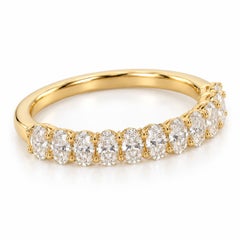 Bague demi-éternité en or jaune 18 carats sertie d'un diamant naturel ovale de 0,58 ct, certifiée IGI