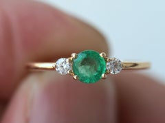Round Emerald and Diamond Three-Stone Ring in 18K Yellow Gold