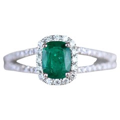 0.66ct Cushion Emerald and Diamond Halo Ring in 18K White Gold