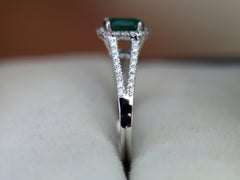 0.66ct Cushion Emerald and Diamond Halo Ring in 18K White Gold