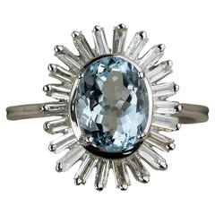 2ct Oval Aquamarine and 0.45ct Diamond Sunburst Ring in 18K White Gold