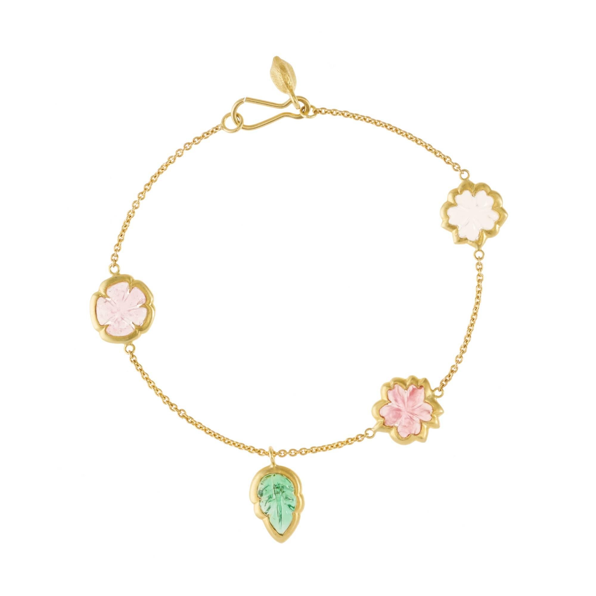 This collection of coloured gem stones cut into a wild meadow of flowers - Tourmalines, Aquamarines and Peridots become blooms, blossoms and leaves to create a sort of Bottecelli celebration of spring in gems.