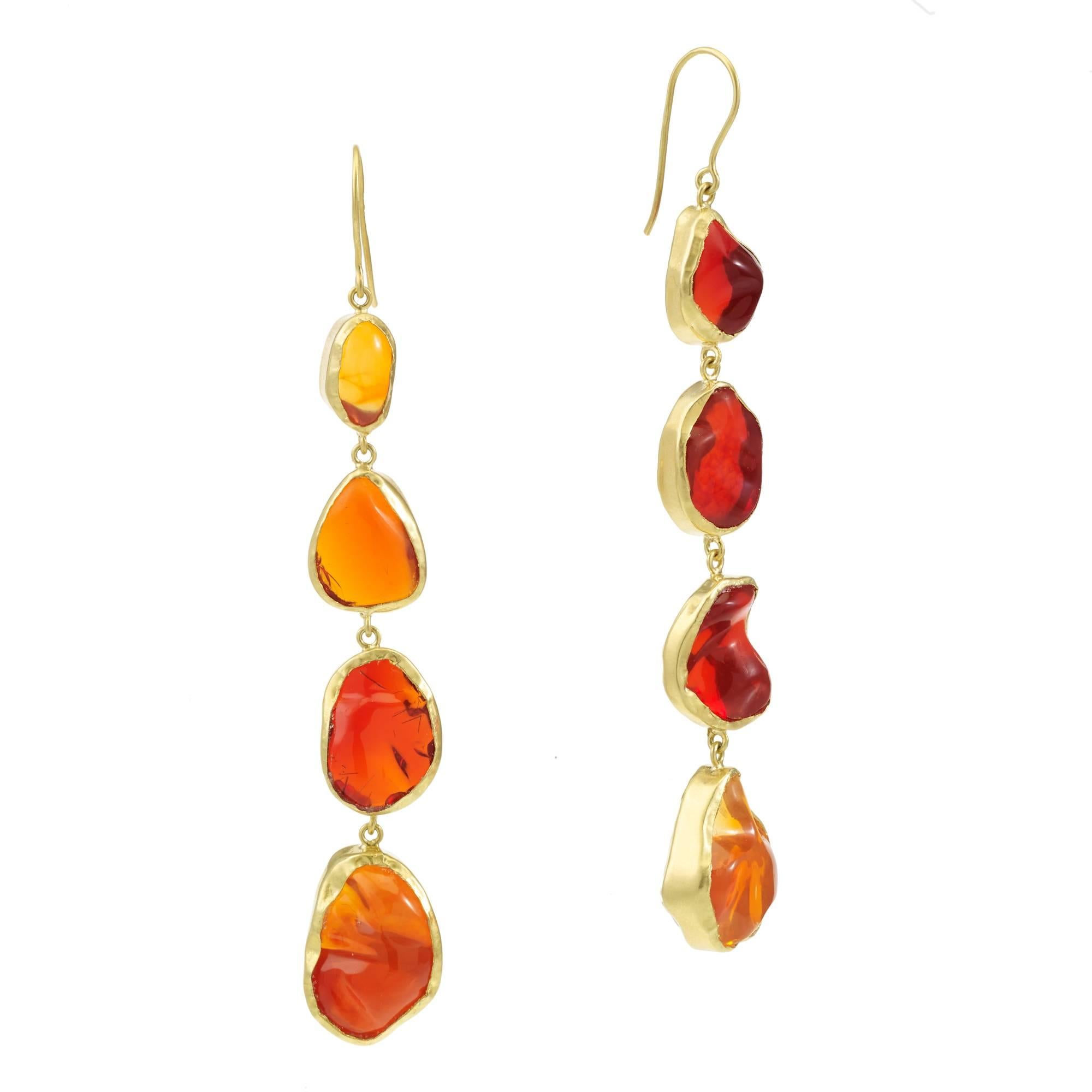 The beautiful ombre tones of Mexico’s finest Fire opal have been combined with Pippa’s love of nature and organic shapes to create an enchanting collection of fluid lines, tumbled pebbles and seductive, baroque pendants. Believed to have been