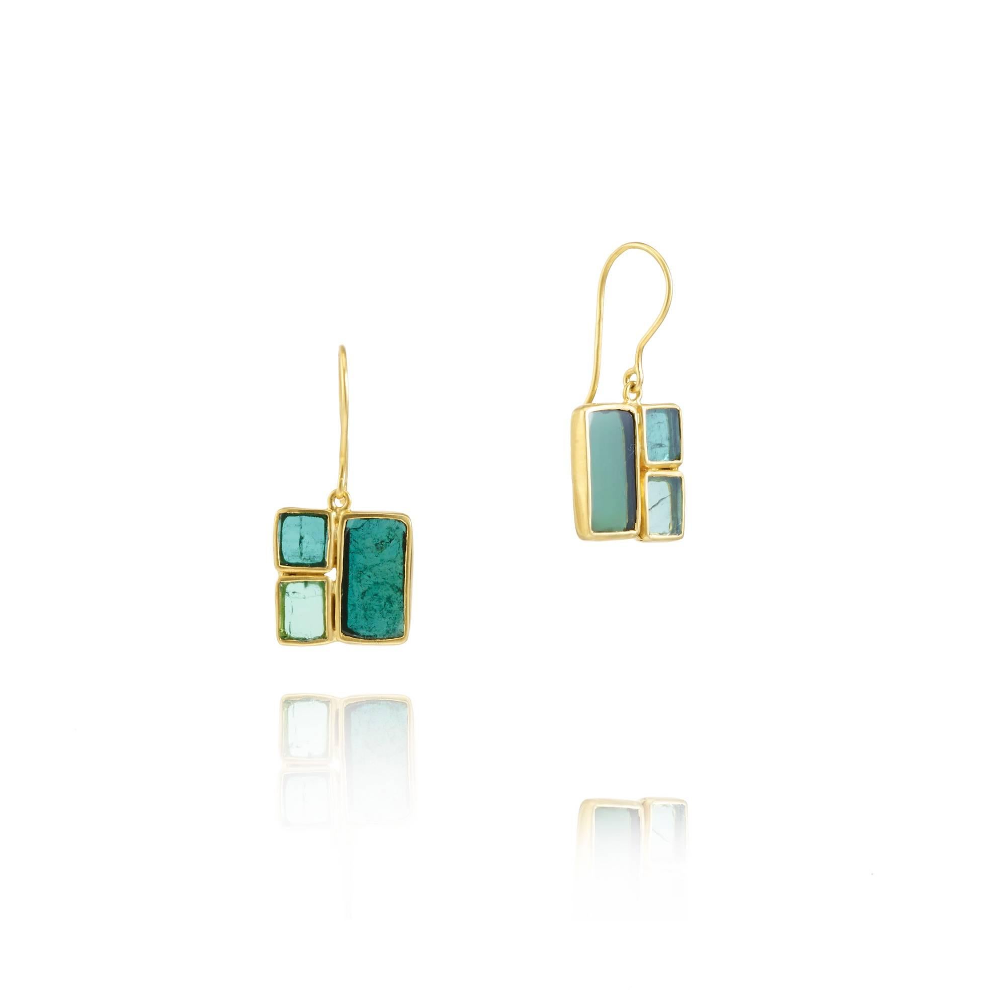 Inspired by the renowned painter's works, the Mondrian earrings feature luminous Green Tourmalines seductively set in an 18kt Gold setting.