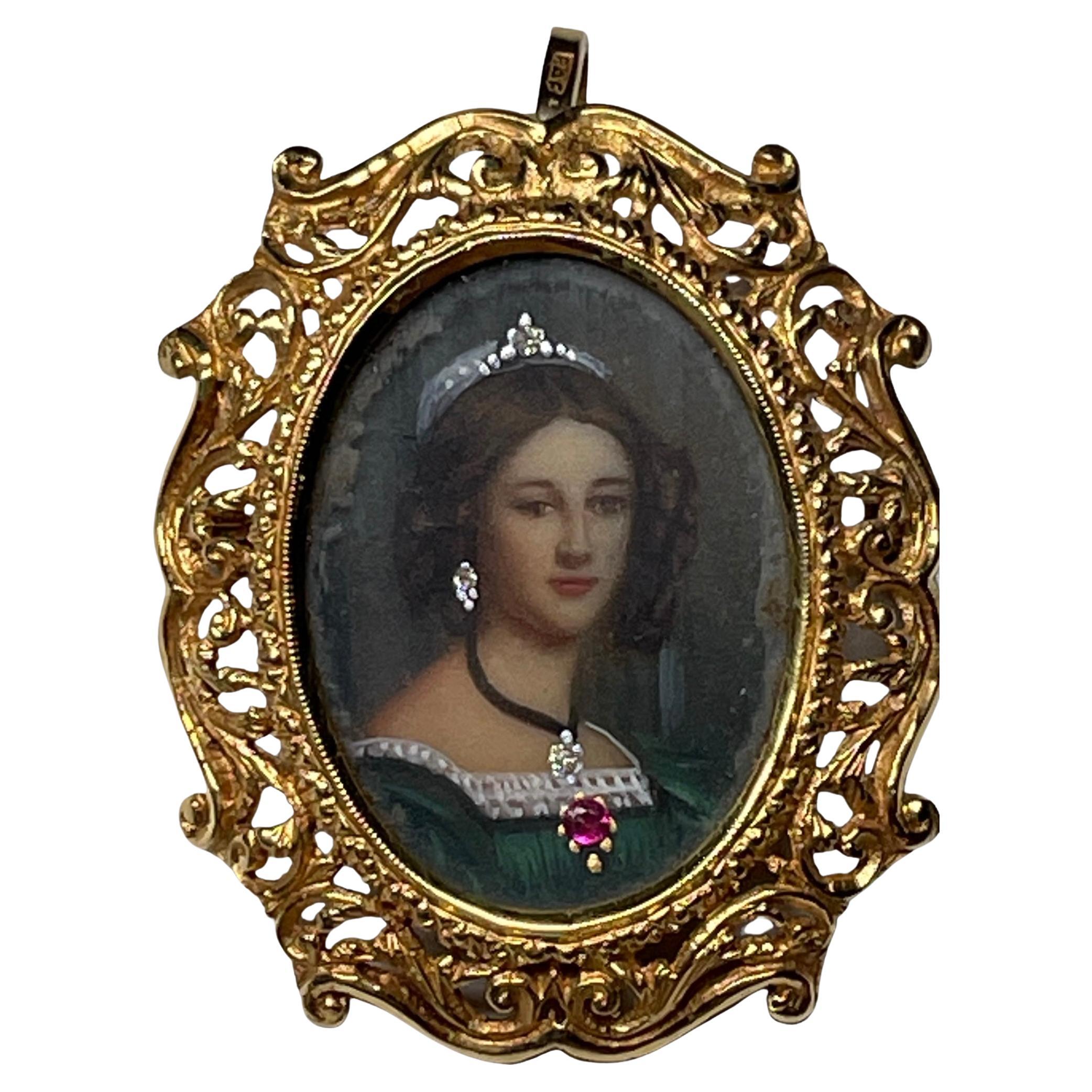 This is an Italian 18K yellow gold portrait pendant/brooch. It depicts an oval shaped brooch/pendant with a hand painted miniature oil painting of an 18th century young lady wearing a small crown, earring and pendant enhanced by tiny diamonds (