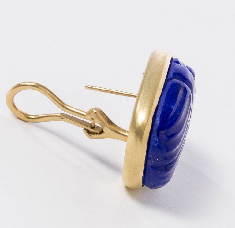 Hand carved by master German carver beautiful lapis lazuli gold flecked scarab earrings set in 18 karat brushed yellow gold bezel with omega clip backs for pierced ears. 22mmx12mmx8mm