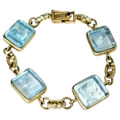 Armband aus 18-karätigem Gold mit Diamantgliedern und blauen MOP-Göttinnenprofilen in geschnitzter Rückansicht