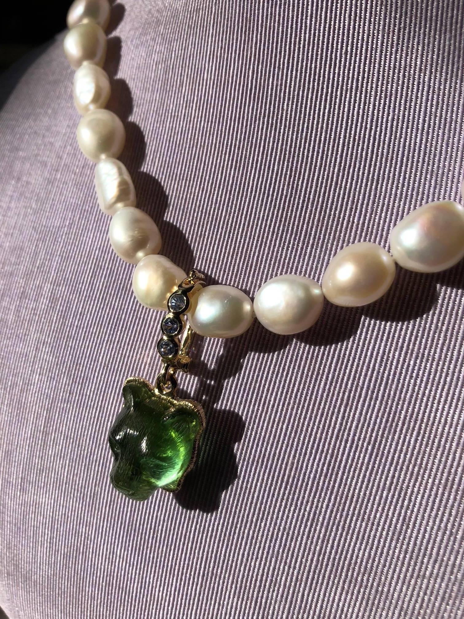 Exquisite Sapphire and gold 18 karat hand carved green tourmaline  Lionshead with 16 inch pearl necklace								
