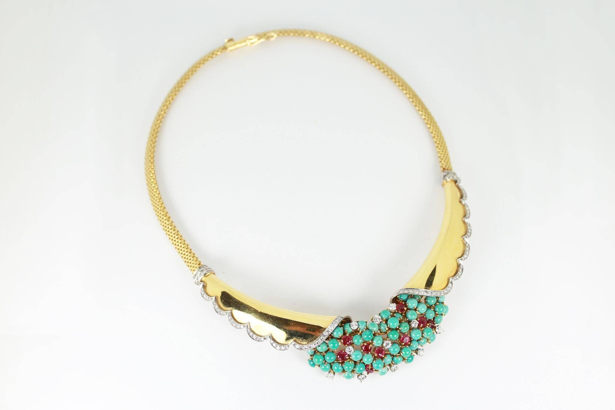 Solid 18K gold necklace inlaid with diamonds, rubies and turquoise stones.