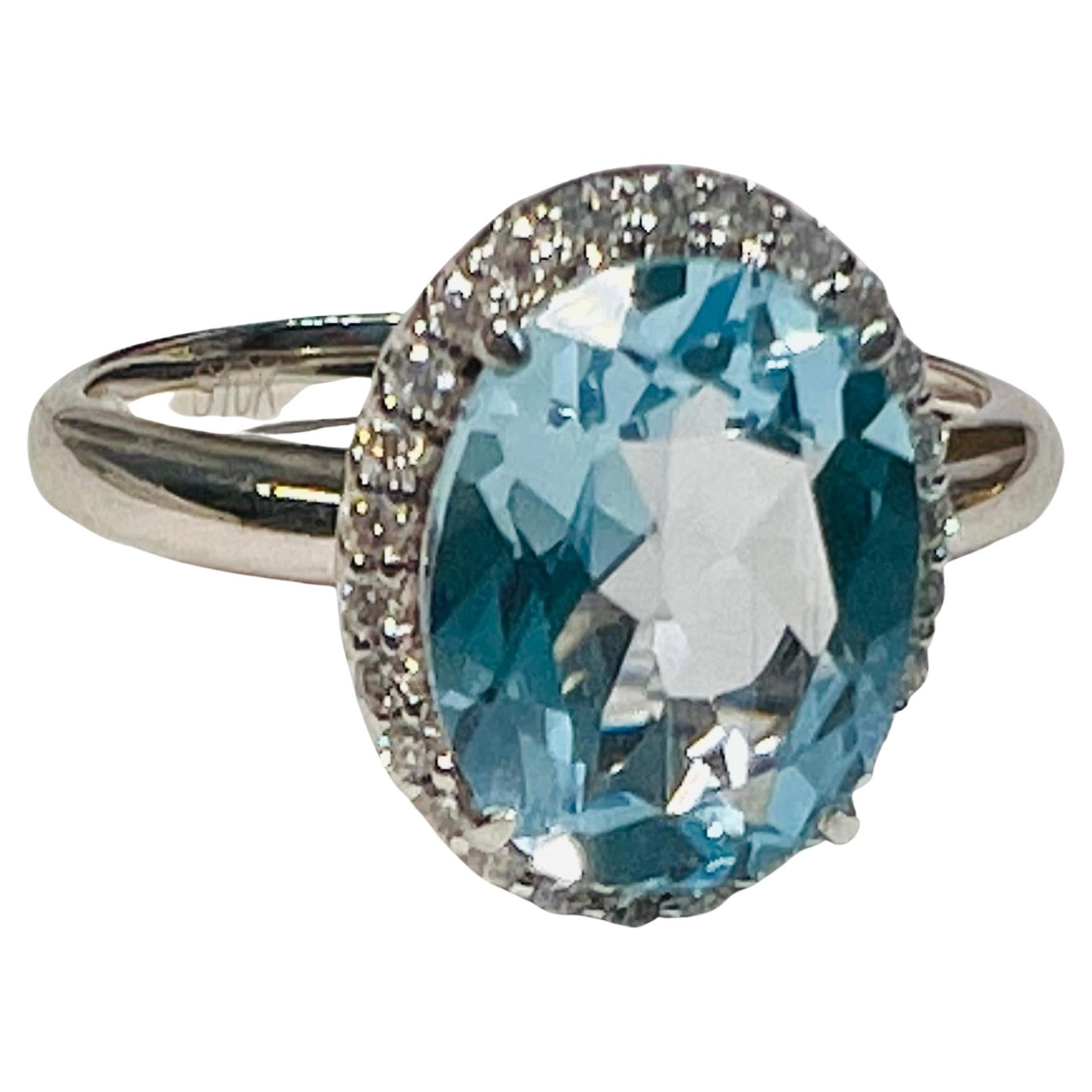 Blue Topaz and Diamond Halo Ring, 10k White Gold