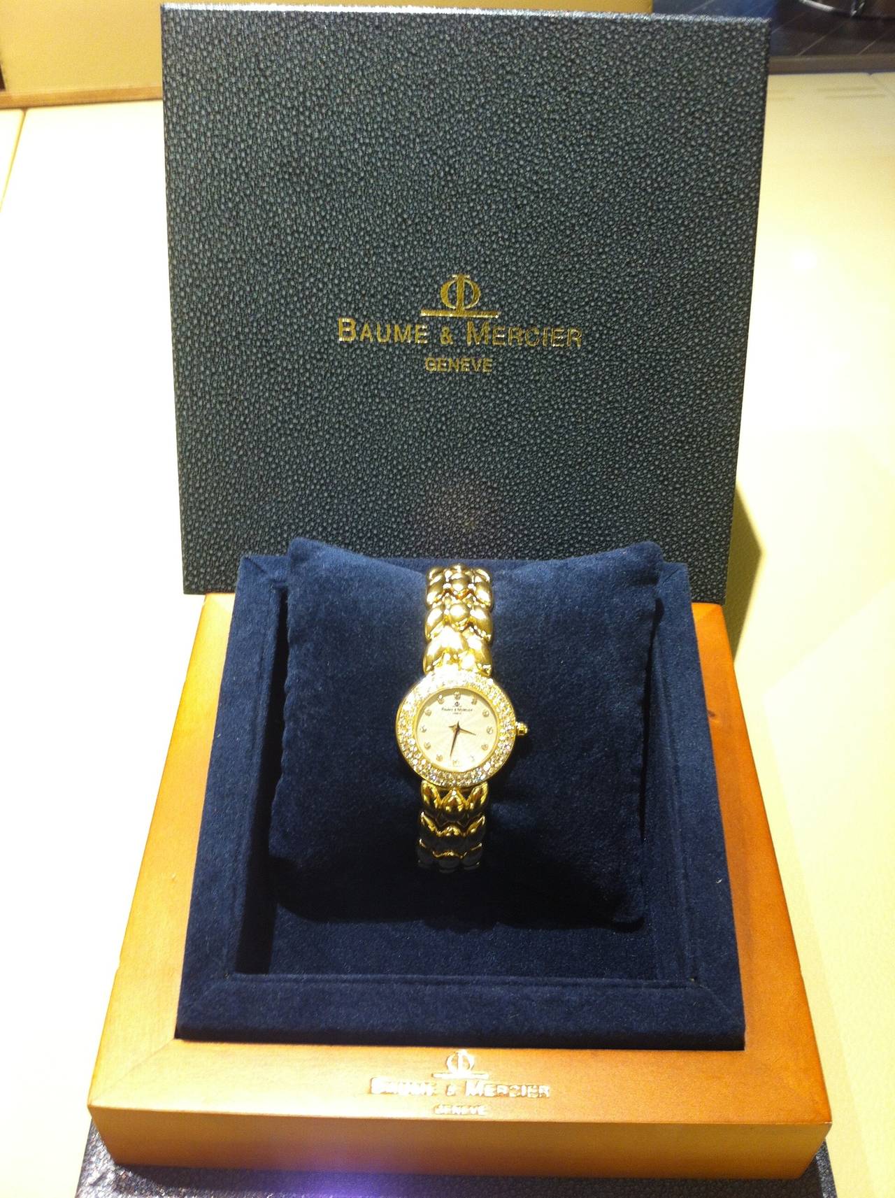 Baume and Mercier Lady's Yellow Gold Diamond Wristwatch at 1stDibs