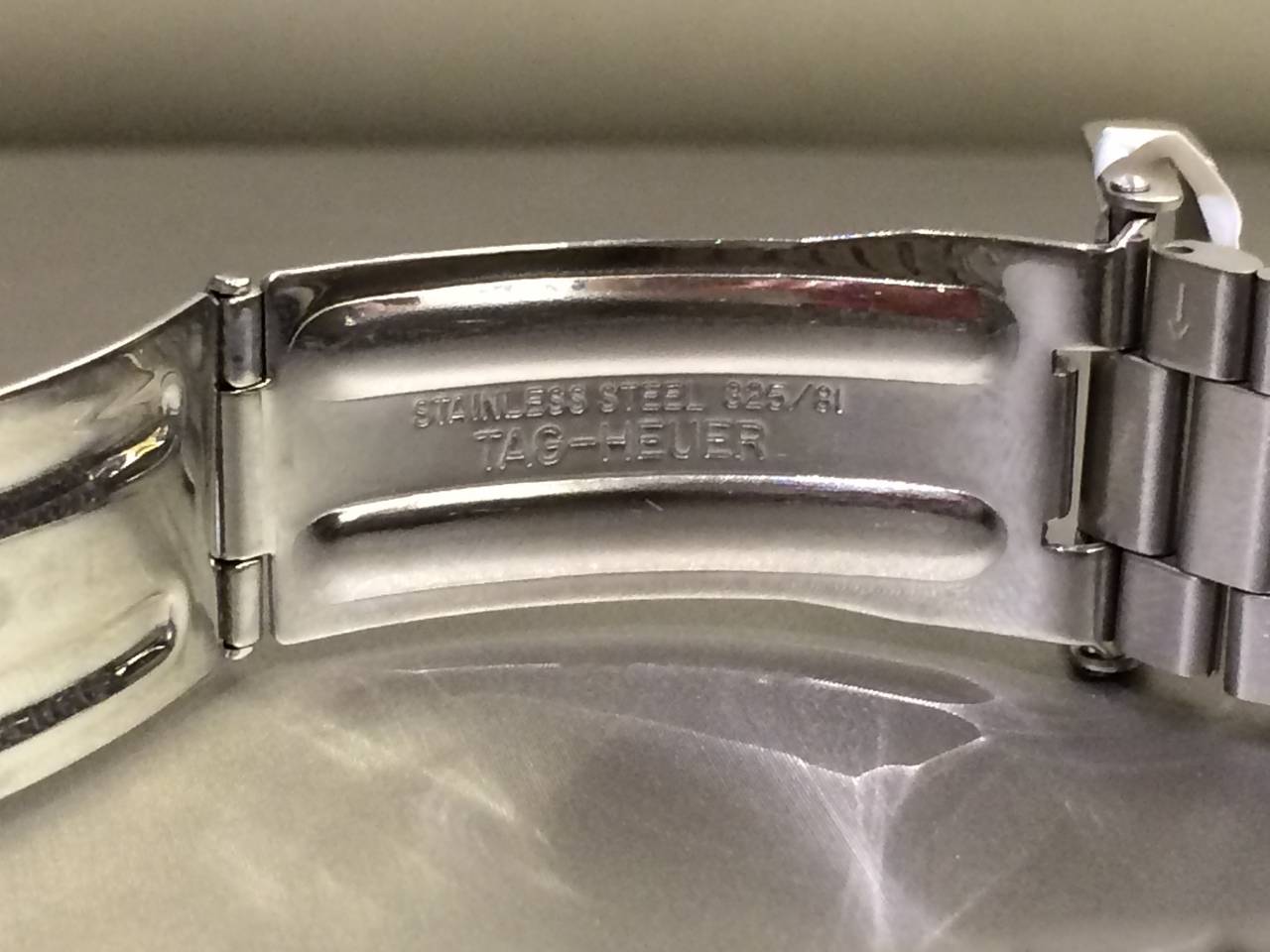 TAG Heuer Stainless Steel Black Dial Professional quartz Wristwatch 1