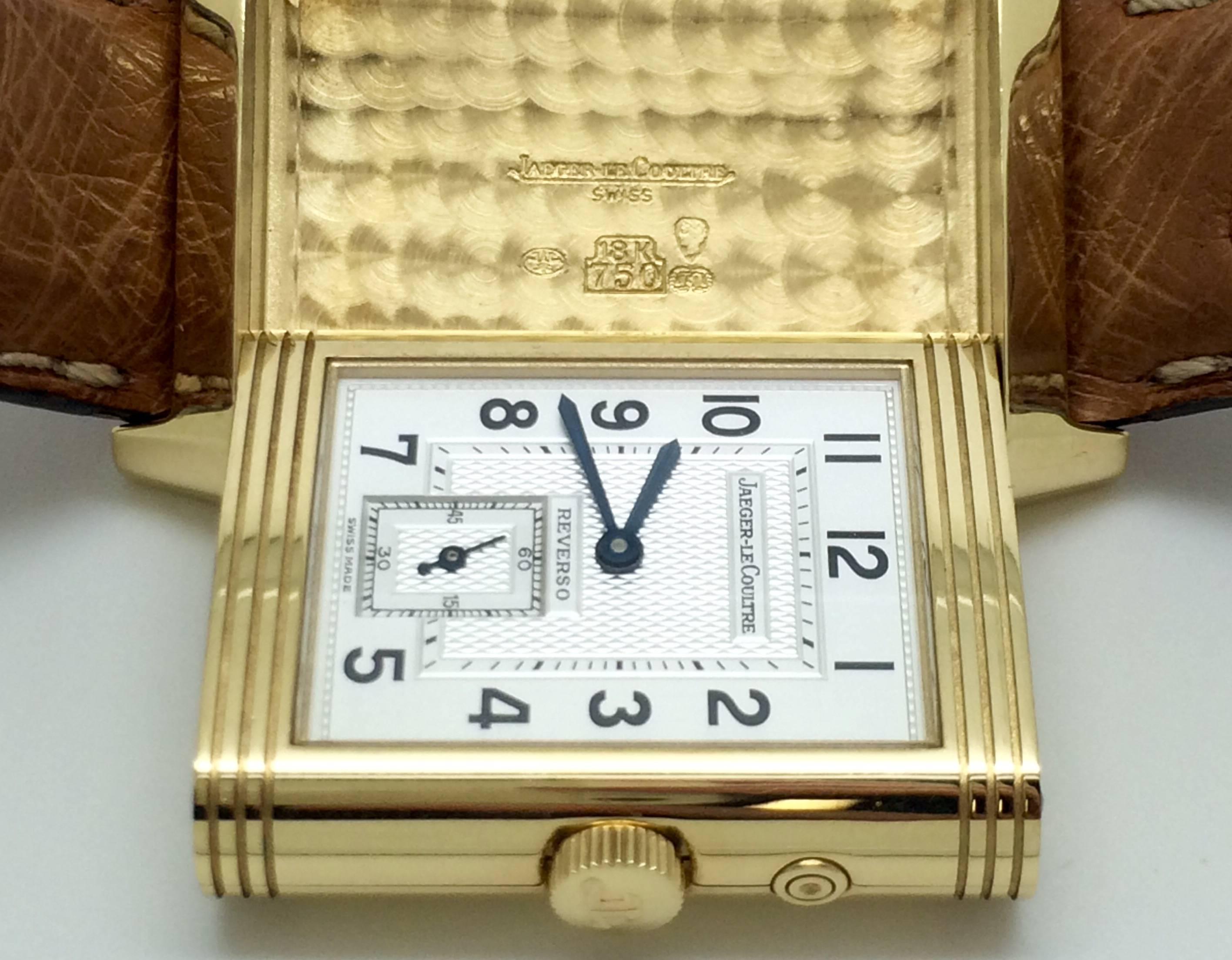 Jaeger-LeCoultre Reverso Duo Face Day & Night 18kt Yellow Gold Wristwatch Ref# 270.1.54.  26mm width by 36mm length, manual winding, 18kt yellow gold case, Ostrich skin strap,  Serial 1743218. A pre-owned watch.