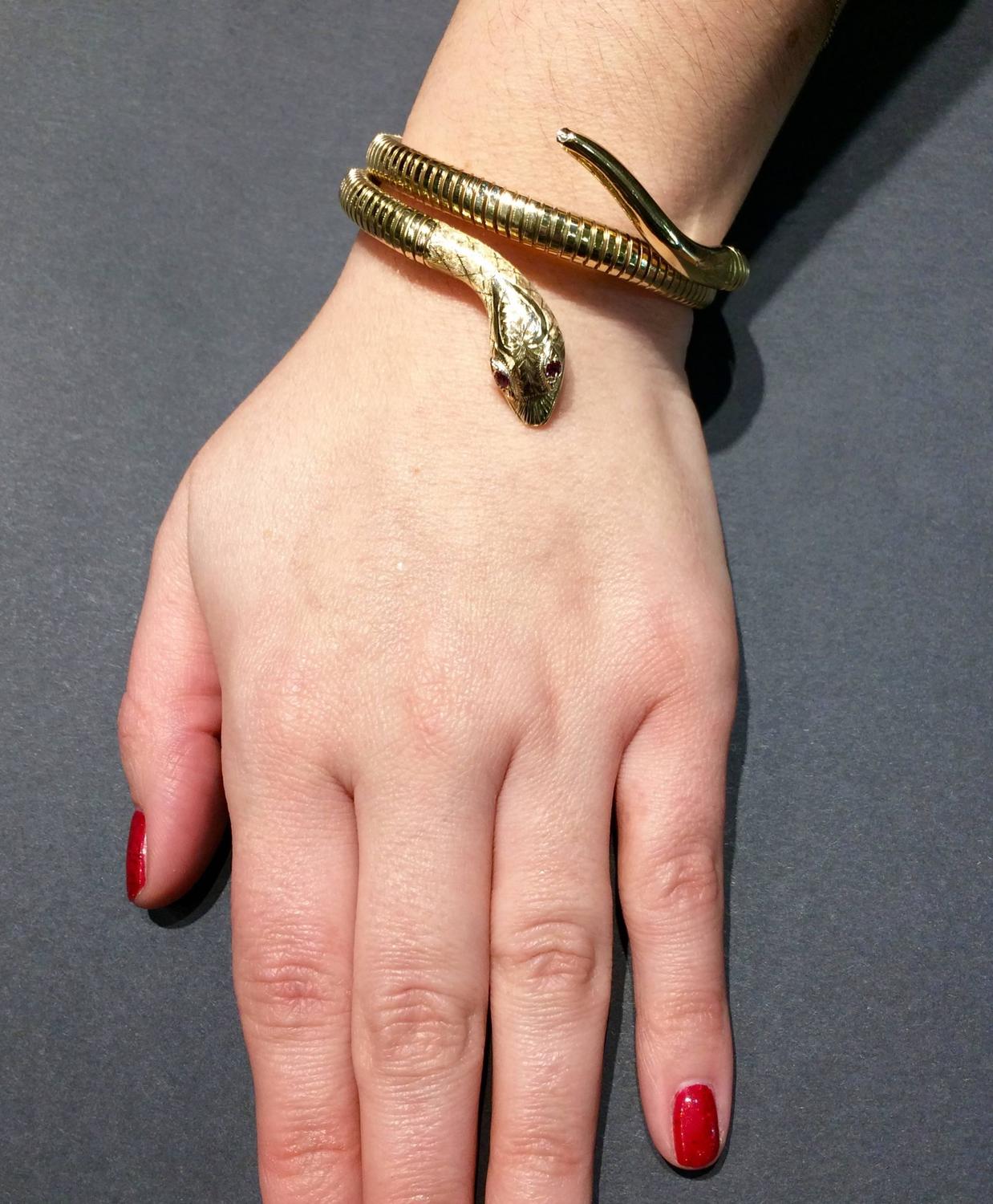 Gold Snake Coil Bracelet with Ruby Eyes For Sale at 1stdibs