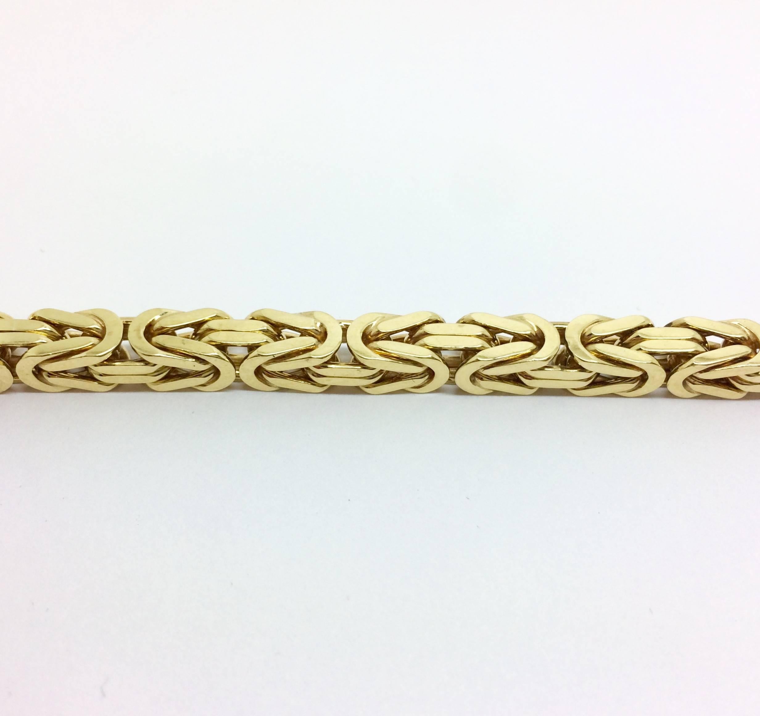 One 18kt yellow gold tight link boxed gold chain.  This chain is versatile enough to be considered unisex, masculine enough for a man but can be worn as a heavier chain on a lady. It contains a safety on each side of clasp enclosure for added