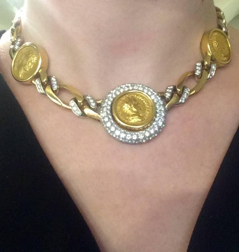 Bulgari 18kt gold Roman ancient coin diamond necklace. Circa 1980's necklace featuring 3 roman coins with a domed bezel of diamonds encircling the centre coin.  Round brilliant cut diamonds exude radiance while surrounded by the richness of yellow